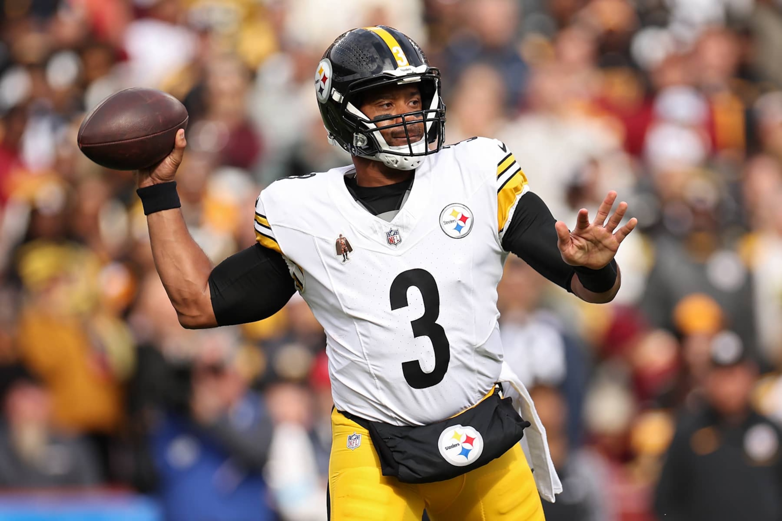 LANDOVER, MARYLAND - NOVEMBER 10: Russell Wilson #3 of the Pittsburgh Steelers looks to pass in the first quarter of a game against the Washington Commanders at Northwest Stadium on November 10, 2024 in Landover, Maryland. (Photo by Scott Taetsch/Getty Images) LANDOVER, MARYLAND - NOVEMBER 10: Russell Wilson #3 of the Pittsburgh Steelers looks to pass in the first quarter of a game against the Washington Commanders at Northwest Stadium on November 10, 2024 in Landover, Maryland. (Photo by Scott Taetsch/Getty Images)