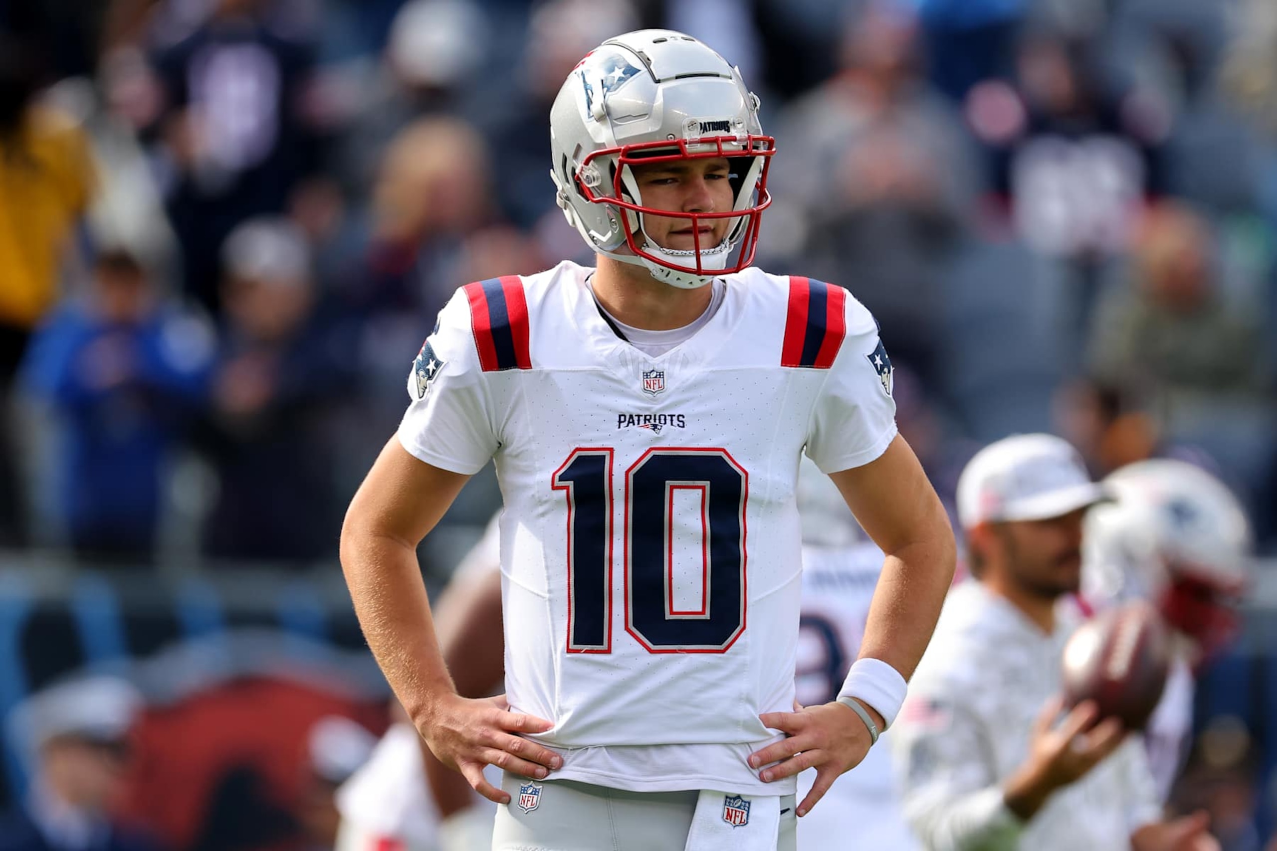 CHICAGO, ILLINOIS - NOVEMBER 10: Drake Maye #10 of the New England Patriots looks on before the game against the Chicago Bears at Soldier Field on November 10, 2024 in Chicago, Illinois. (Photo by Michael Reaves/Getty Images) CHICAGO, ILLINOIS - NOVEMBER 10: Drake Maye #10 of the New England Patriots looks on before the game against the Chicago Bears at Soldier Field on November 10, 2024 in Chicago, Illinois. (Photo by Michael Reaves/Getty Images)