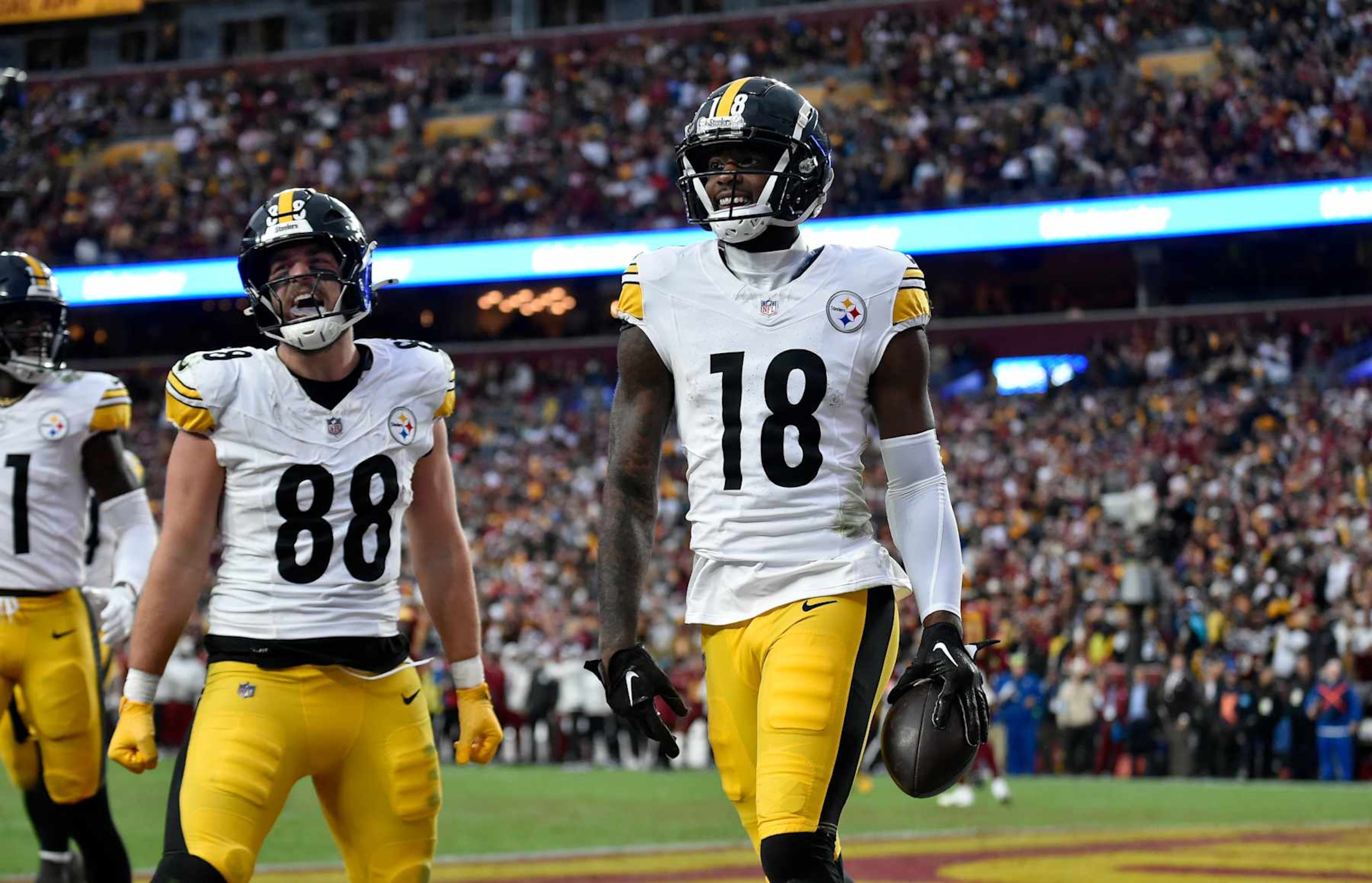 LANDOVER, MD - NOVEMBER 10: Steelers wide receiver Mike Williams (18) celebrates with tight end Pat Freiermuth (88) after his game-winning touchdown catch during the Pittsburgh Steelers versus Washington Commanders National Football League game at Northwest Stadium on November 10, 2024 in Landover, MD. (Photo by Randy Litzinger/Icon Sportswire via Getty Images) LANDOVER, MD - NOVEMBER 10: Steelers wide receiver Mike Williams (18) celebrates with tight end Pat Freiermuth (88) after his game-winning touchdown catch during the Pittsburgh Steelers versus Washington Commanders National Football League game at Northwest Stadium on November 10, 2024 in Landover, MD. (Photo by Randy Litzinger/Icon Sportswire via Getty Images)