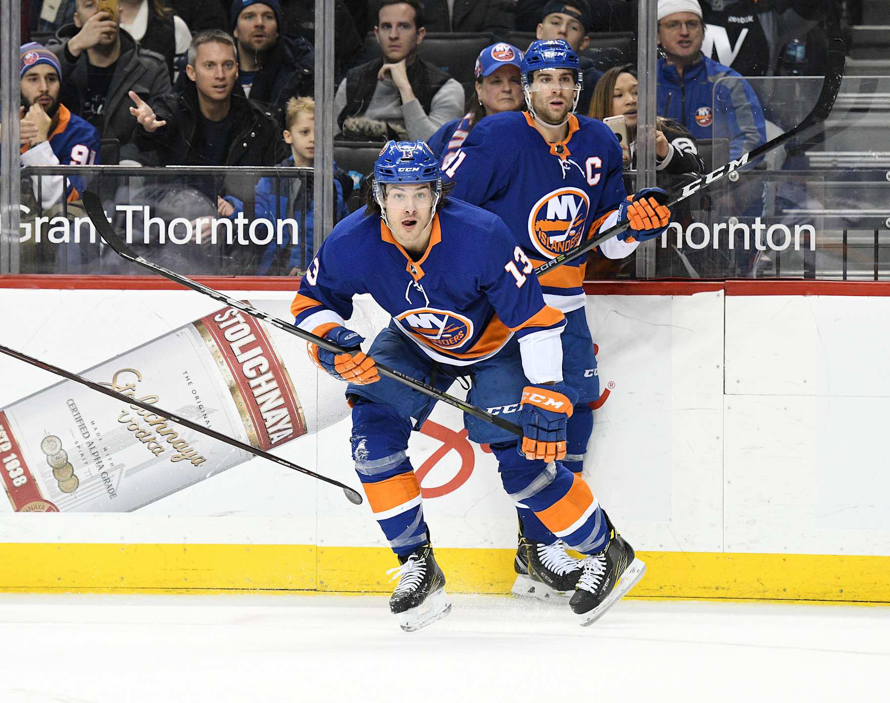 New York Islanders forward Mathew Barzal (foreground) and former Isles captain John Tavares. 