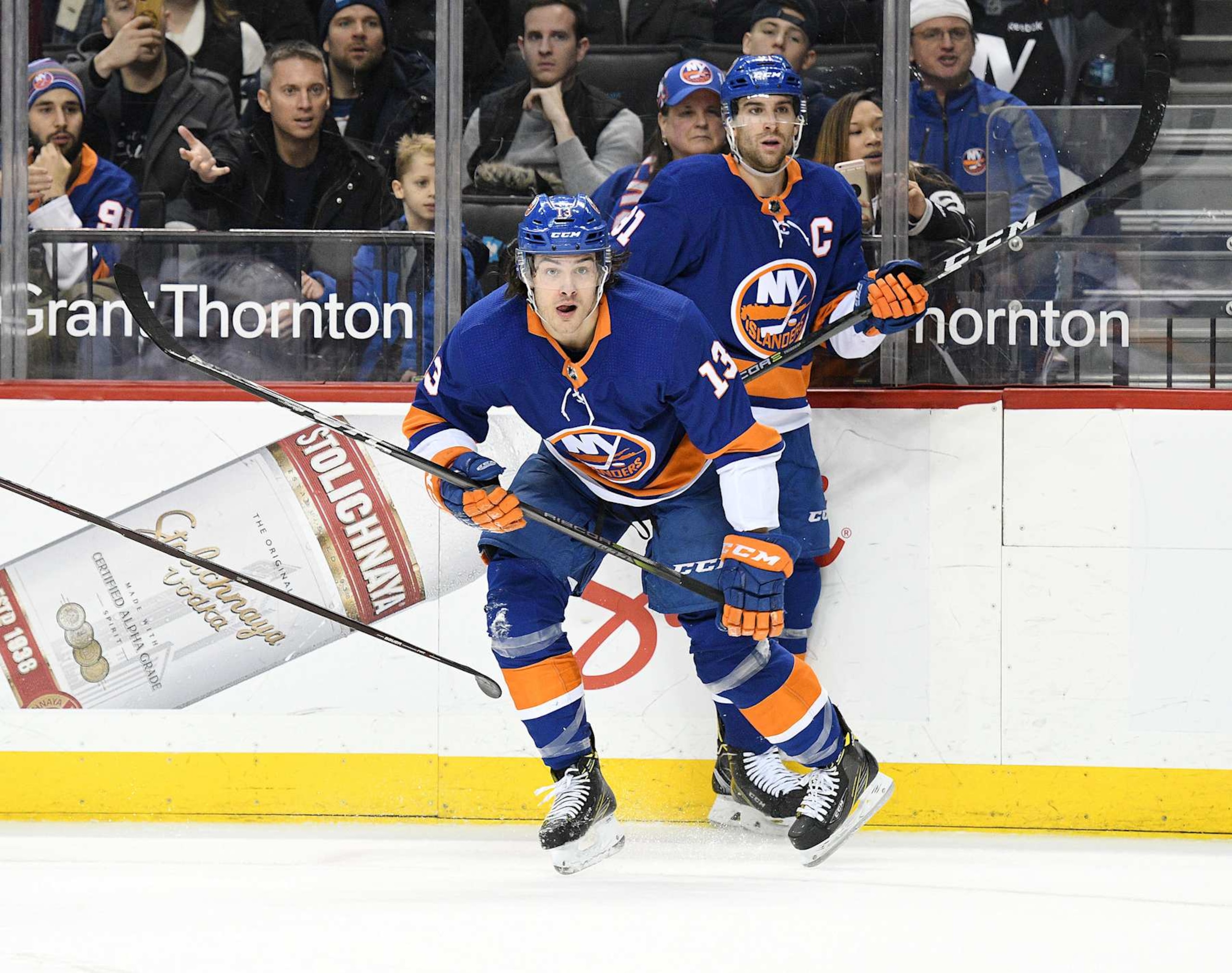 New York Islanders forward Mathew Barzal (foreground) and former Isles captain John Tavares. New York Islanders forward Mathew Barzal (foreground) and former Isles captain John Tavares.