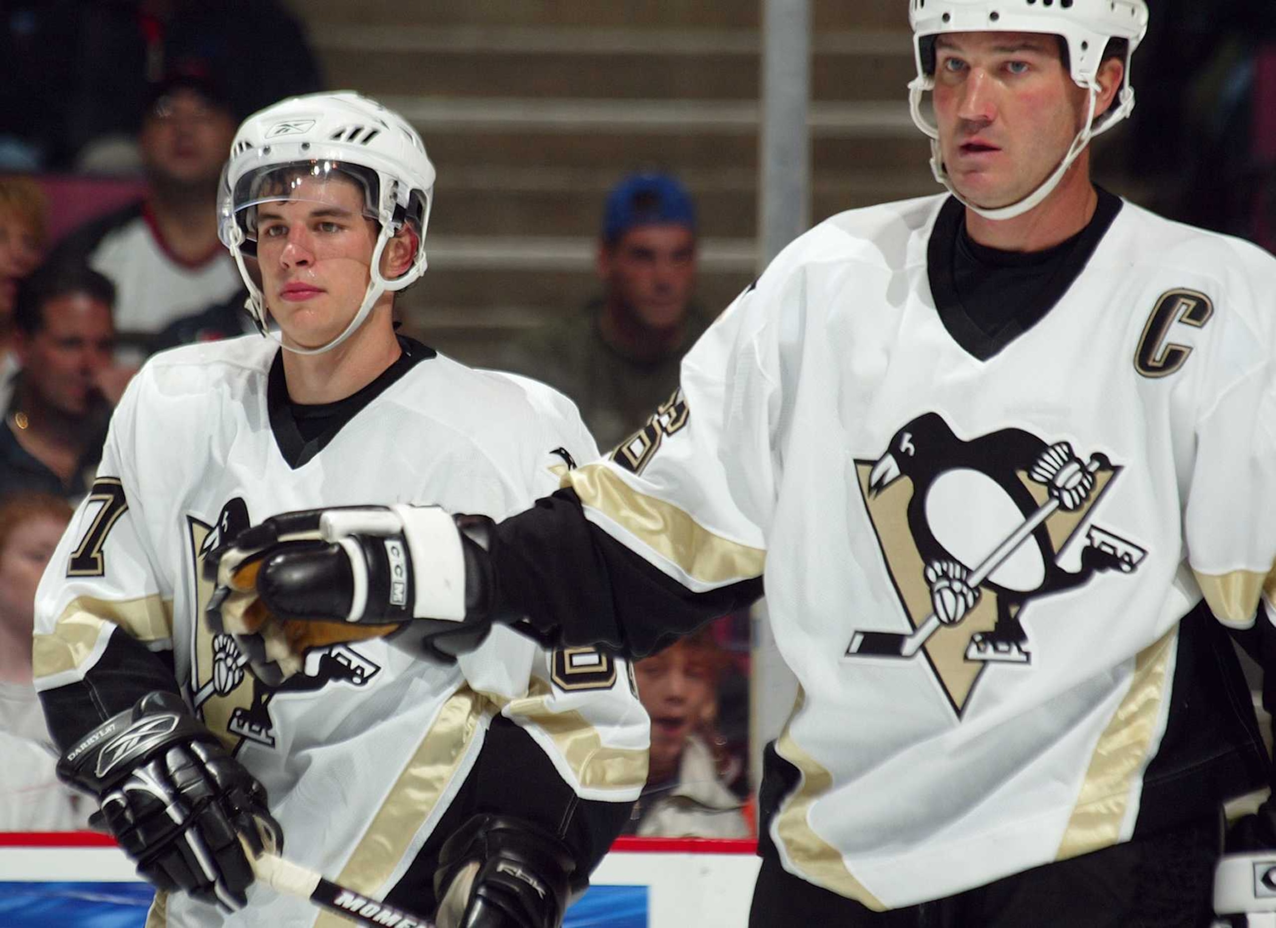 Pittsburgh Penguins current captain Sidney Crosby (left) and former captain Mario Lemieux as teammates in 2005. Pittsburgh Penguins current captain Sidney Crosby (left) and former captain Mario Lemieux as teammates in 2005.