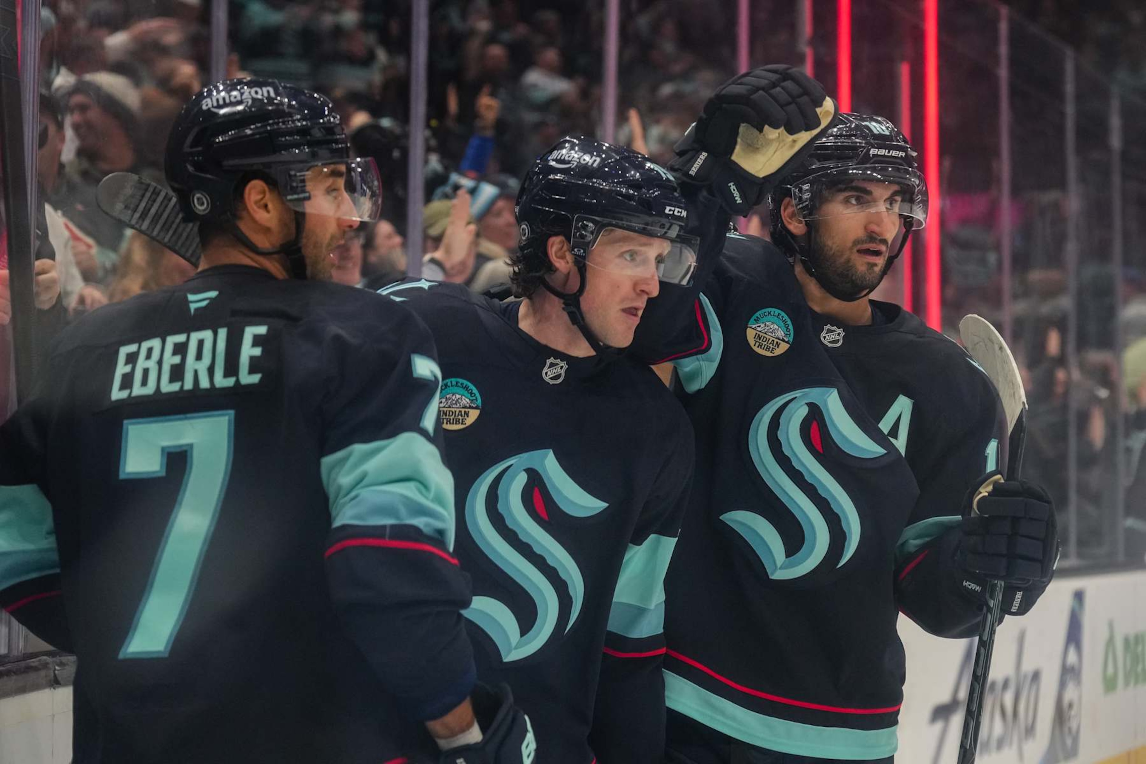 Seattle Kraken forwards Jordan Eberle (left), Jared McCann and Matty Beniers. 