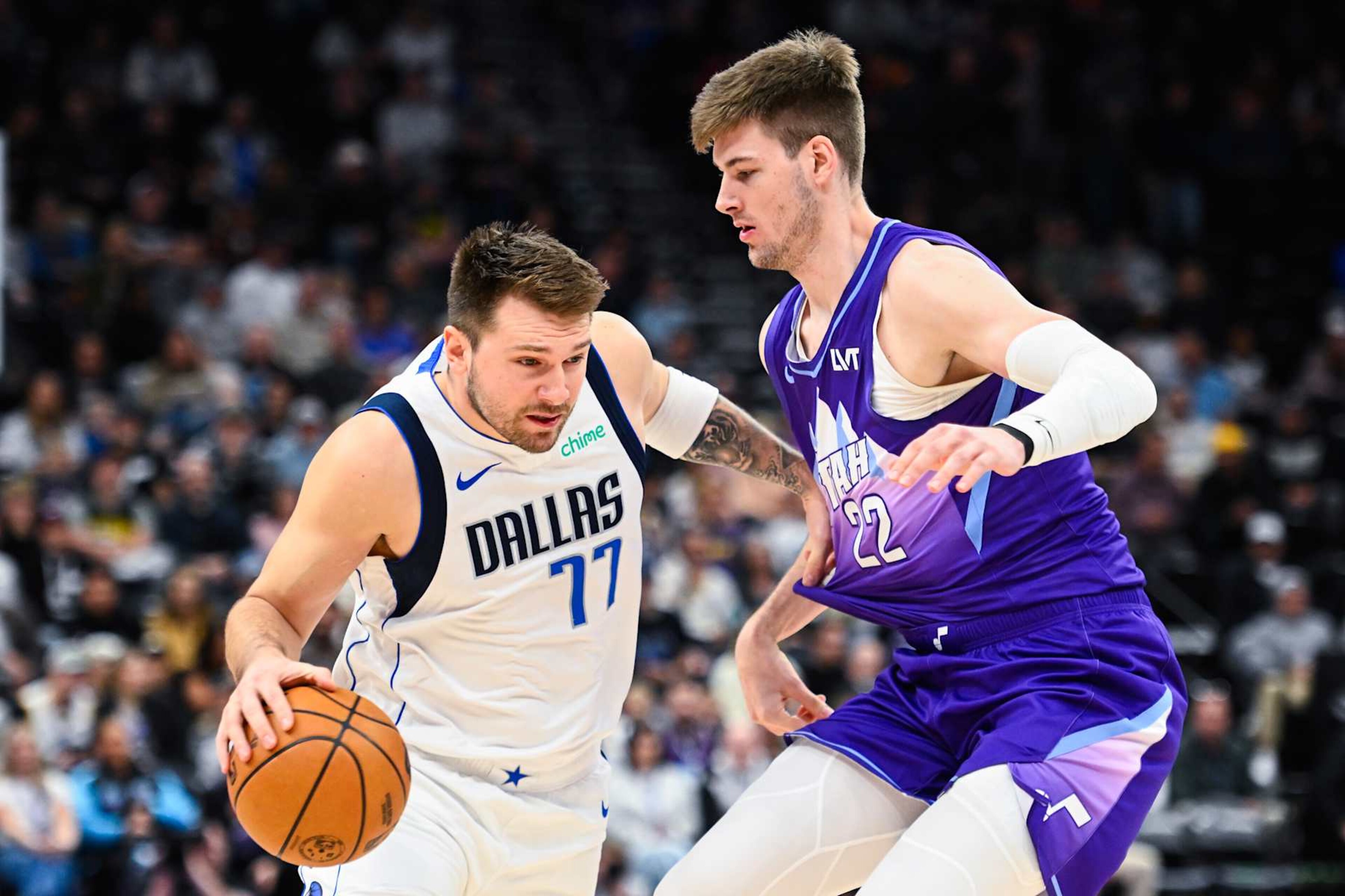 SALT LAKE CITY, UTAH - NOVEMBER 14: Luka Doncic #77 of the Dallas Mavericks drives into Kyle Filipowski #22 of the Utah Jazz during the first half of a game at Delta Center on November 14, 2024 in Salt Lake City, Utah. NOTE TO USER: User expressly acknowledges and agrees that, by downloading and or using this photograph, User is consenting to the terms and conditions of the Getty Images License Agreement. (Photo by Alex Goodlett/Getty Images) SALT LAKE CITY, UTAH - NOVEMBER 14: Luka Doncic #77 of the Dallas Mavericks drives into Kyle Filipowski #22 of the Utah Jazz during the first half of a game at Delta Center on November 14, 2024 in Salt Lake City, Utah. NOTE TO USER: User expressly acknowledges and agrees that, by downloading and or using this photograph, User is consenting to the terms and conditions of the Getty Images License Agreement. (Photo by Alex Goodlett/Getty Images)