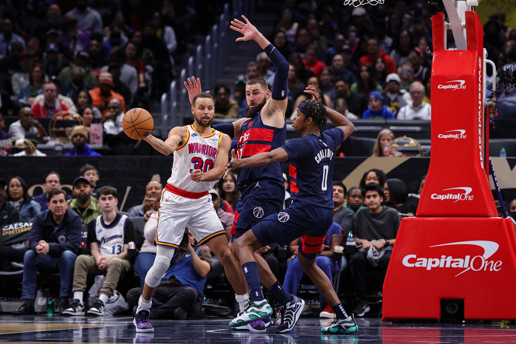 Stephen Curry, Jonas ValanÄiÅ«nas and Bilal Coulibaly
