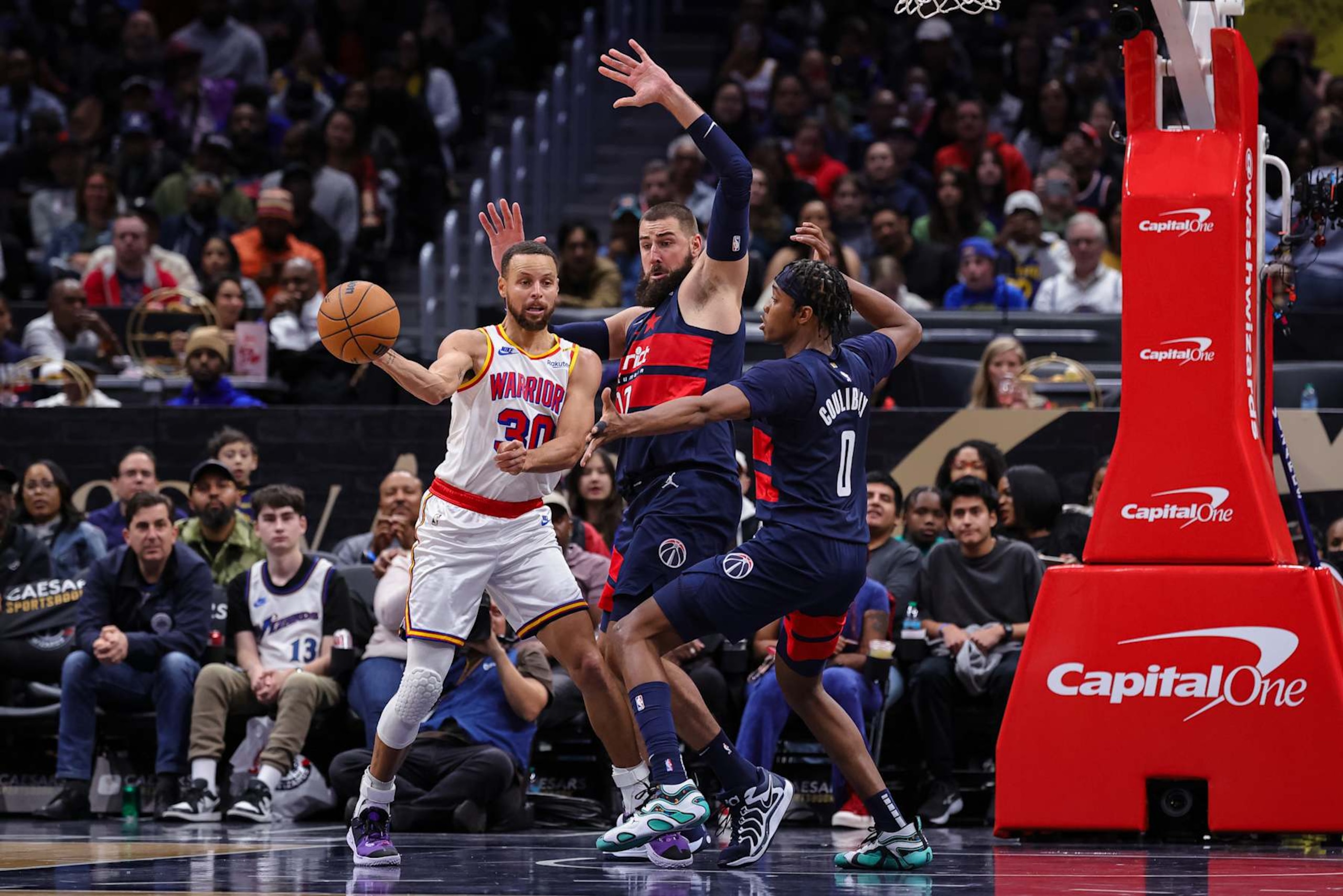 Stephen Curry, Jonas ValanÄiÅ«nas and Bilal Coulibaly
