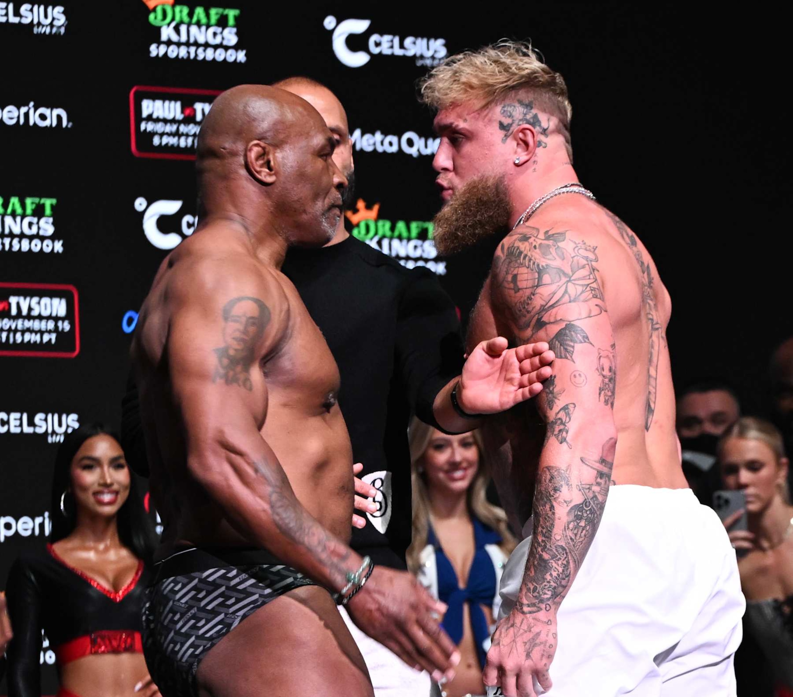 IRVING, TEXAS - NOVEMBER 14: Mike Tyson and Jake Paul faceoff during Weigh-In at the Toyota Music Factory in Irving, Texas on November 14, 2024 ahead of their match for heavyweight world titles of the Premiere Boxing Championship which will be on November 15 Friday night at AT&T Stadium in Arlington, Texas, United States. (Photo by Tayfun Coskun/Anadolu via Getty Images)