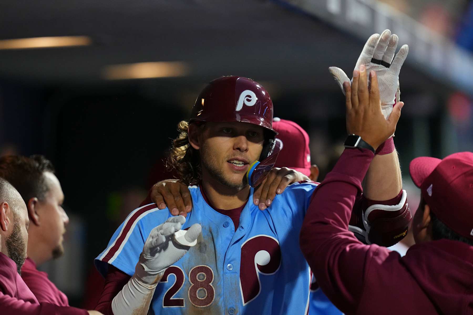 PHILADELPHIA, PENNSYLVANIA - APRIL 11: Alec Bohm #28 of the Philadelphia Phillies celebrates with teammates after hitting a solo home run in the bottom of the fourth inning against the Pittsburgh Pirates at Citizens Bank Park on April 11, 2024 in Philadelphia, Pennsylvania. (Photo by Mitchell Leff/Getty Images)
