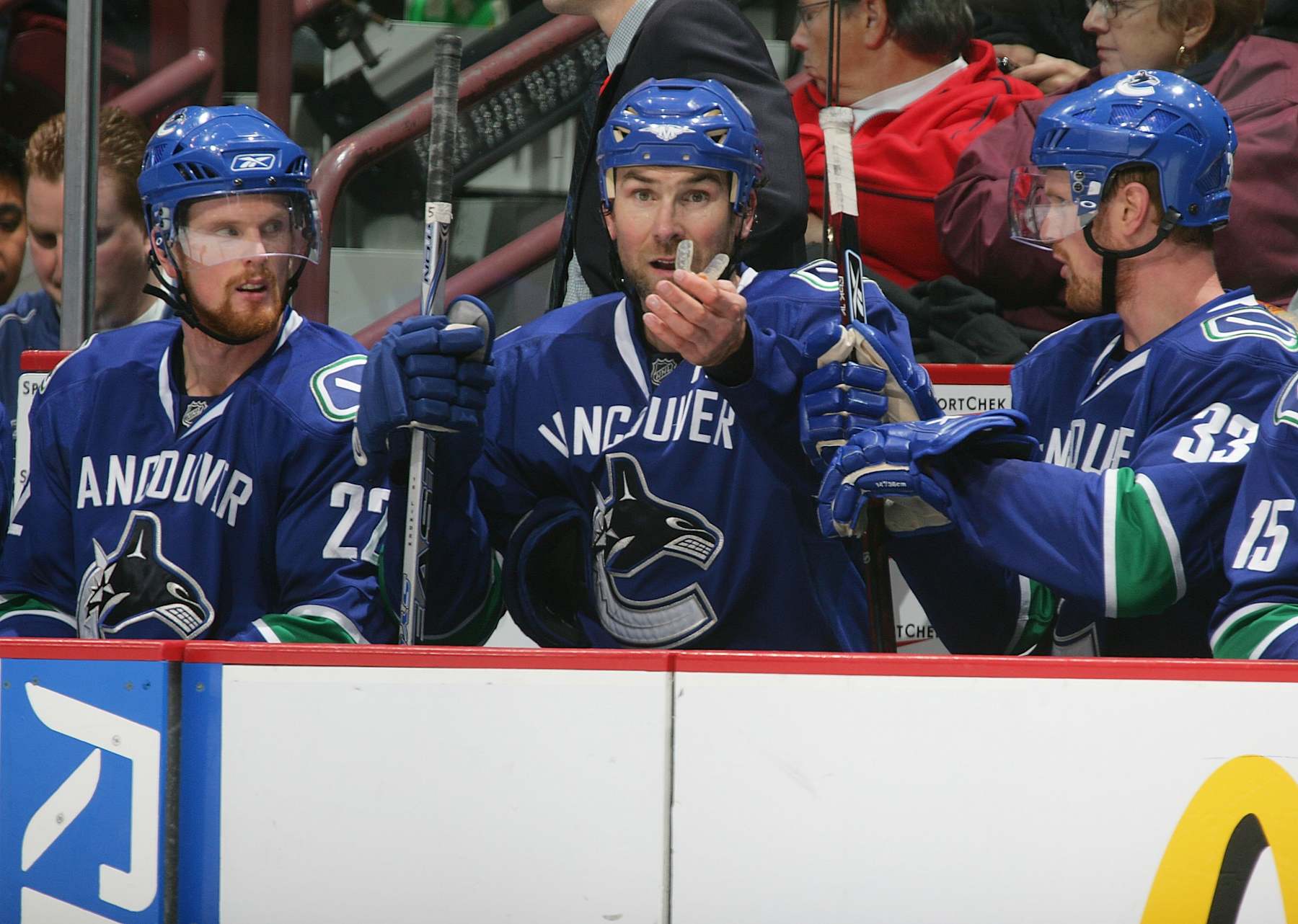 Former Vancouver Canucks forwards Daniel Sedin, Trevor Linden and Henrik Sedin.