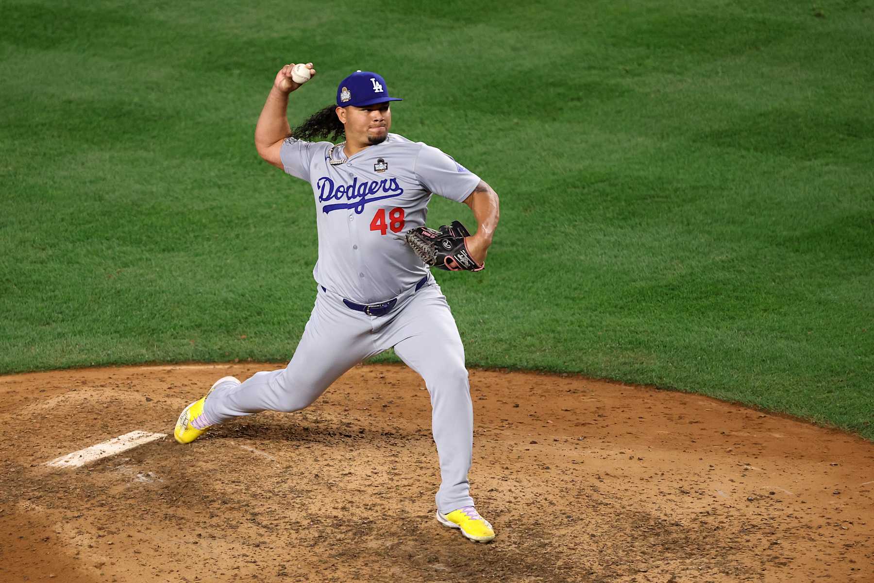 NEW YORK, NEW YORK - OCTOBER 30:  Brusdar Graterol #48 of the Los Angeles Dodgers pitches during the sixth inning of Game Five of the 2024 World Series against the New York Yankees at Yankee Stadium on October 30, 2024 in the Bronx borough of New York City. (Photo by Luke Hales/Getty Images)