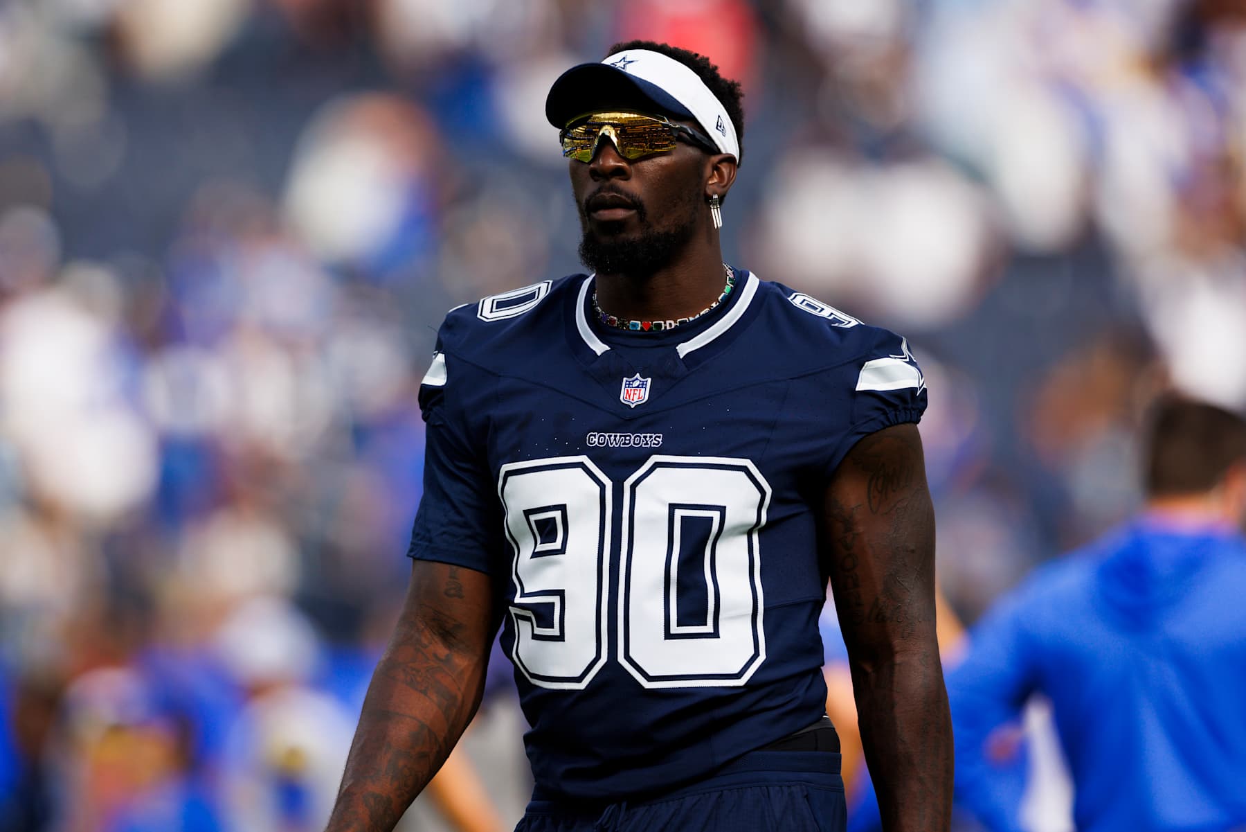 INGLEWOOD, CALIFORNIA - AUGUST 11: DeMarcus Lawrence #90 of the Dallas Cowboys walks off the field during a preseason game against the Los Angeles Rams at SoFi Stadium on August 11, 2024 in Inglewood, California. (Photo by Ric Tapia/Getty Images)