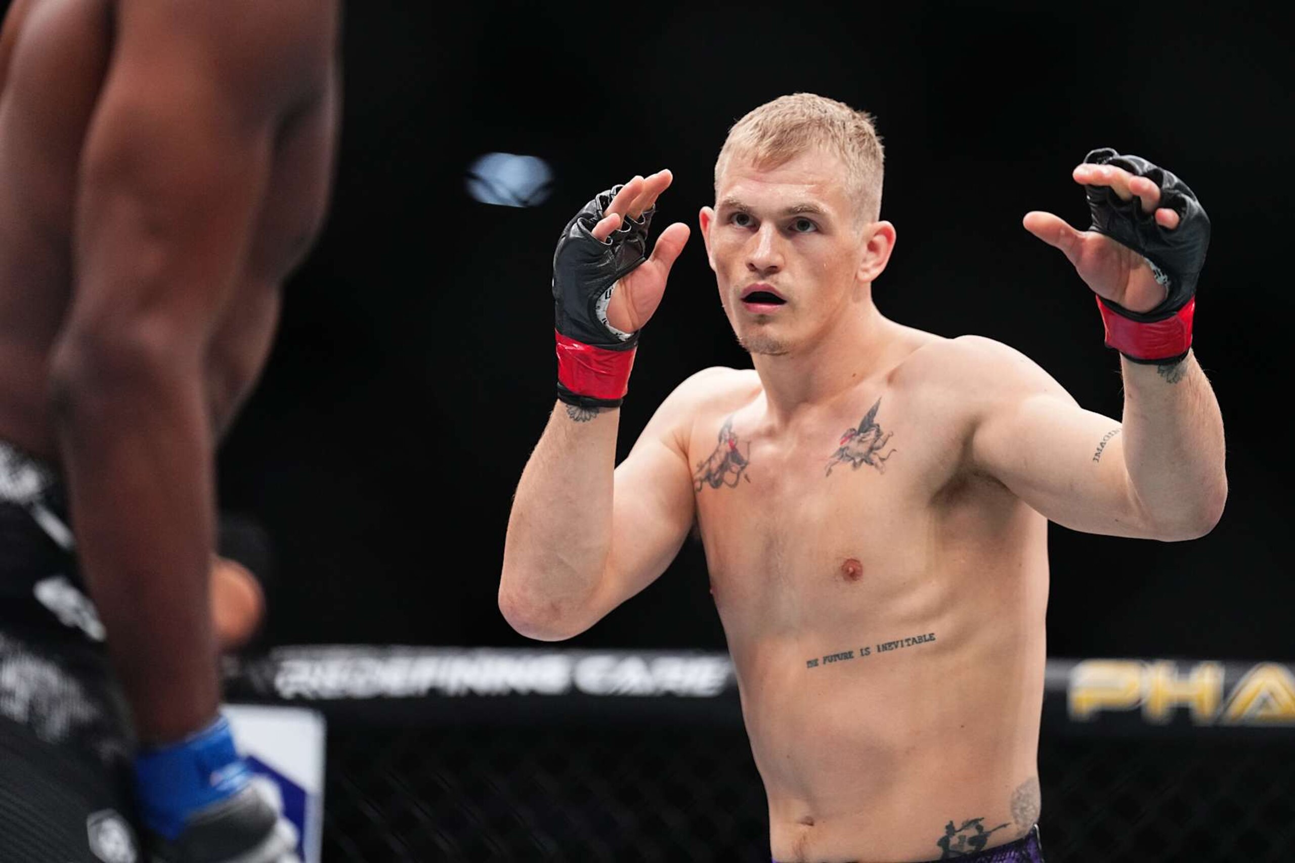 LAS VEGAS, NEVADA - JUNE 29: Ian Machado Garry of Ireland faces off with Michael Page of England in a welterweight fight during the UFC 303 event at T-Mobile Arena on June 29, 2024 in Las Vegas, Nevada. (Photo by Chris Unger/Zuffa LLC via Getty Images) LAS VEGAS, NEVADA - JUNE 29: Ian Machado Garry of Ireland faces off with Michael Page of England in a welterweight fight during the UFC 303 event at T-Mobile Arena on June 29, 2024 in Las Vegas, Nevada. (Photo by Chris Unger/Zuffa LLC via Getty Images)
