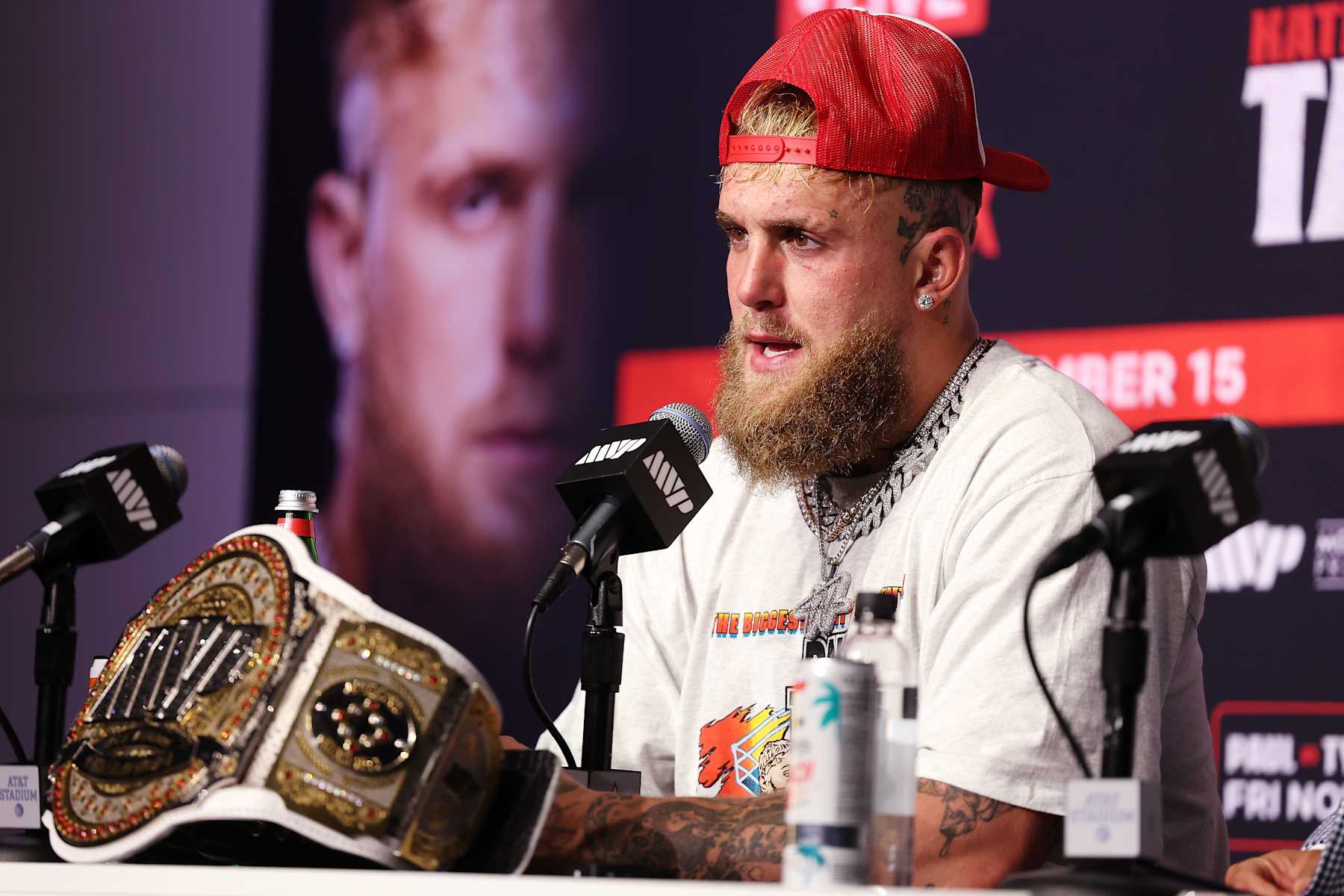 ARLINGTON, TEXAS - NOVEMBER 15: Jake Paul speaks during the post match press conference for LIVE On Netflix: Jake Paul vs. Mike Tyson at AT&T Stadium on November 15, 2024 in Arlington, Texas. (Photo by Al Bello/Getty Images for Netflix © 2024)