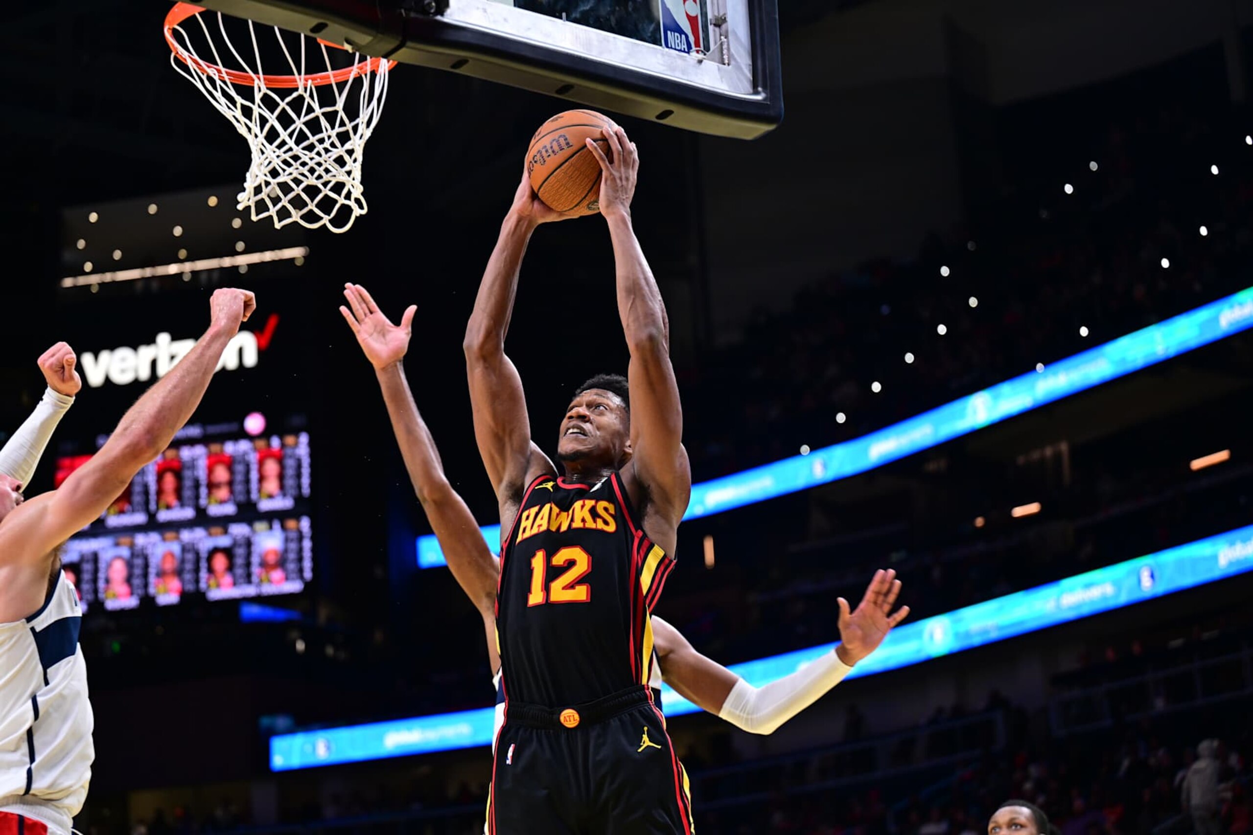 ATLANTA, GA - NOVEMBER 15: De'Andre Hunter #12 of the Atlanta Hawks dunks the ball during the game against the Washington Wizards during the Emirates NBA Cup game on November 15, 2024 at State Farm Arena in Atlanta, Georgia. NOTE TO USER: User expressly acknowledges and agrees that, by downloading and/or using this Photograph, user is consenting to the terms and conditions of the Getty Images License Agreement. Mandatory Copyright Notice: Copyright 2024 NBAE (Photo by Adam Hagy/NBAE via Getty Images) ATLANTA, GA - NOVEMBER 15: De'Andre Hunter #12 of the Atlanta Hawks dunks the ball during the game against the Washington Wizards during the Emirates NBA Cup game on November 15, 2024 at State Farm Arena in Atlanta, Georgia. NOTE TO USER: User expressly acknowledges and agrees that, by downloading and/or using this Photograph, user is consenting to the terms and conditions of the Getty Images License Agreement. Mandatory Copyright Notice: Copyright 2024 NBAE (Photo by Adam Hagy/NBAE via Getty Images)