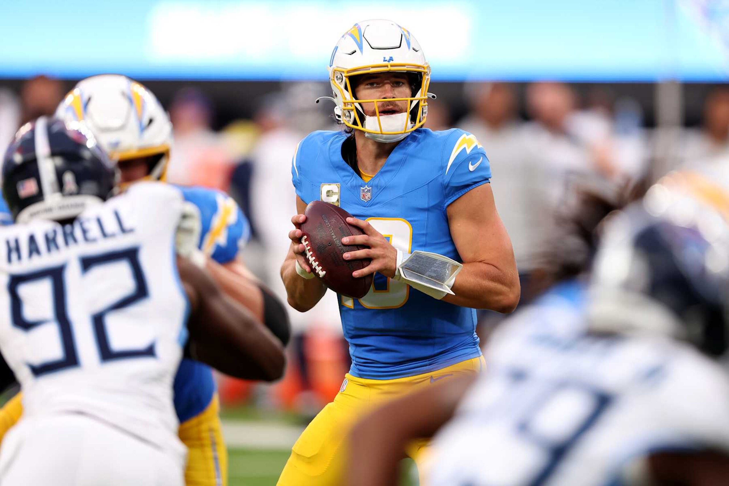 INGLEWOOD, CALIFORNIA - NOVEMBER 10: Justin Herbert #10 of the Los Angeles Chargers drops back to pass during a game against the Tennessee Titans at SoFi Stadium on November 10, 2024 in Inglewood, California. (Photo by Sean M. Haffey/Getty Images)