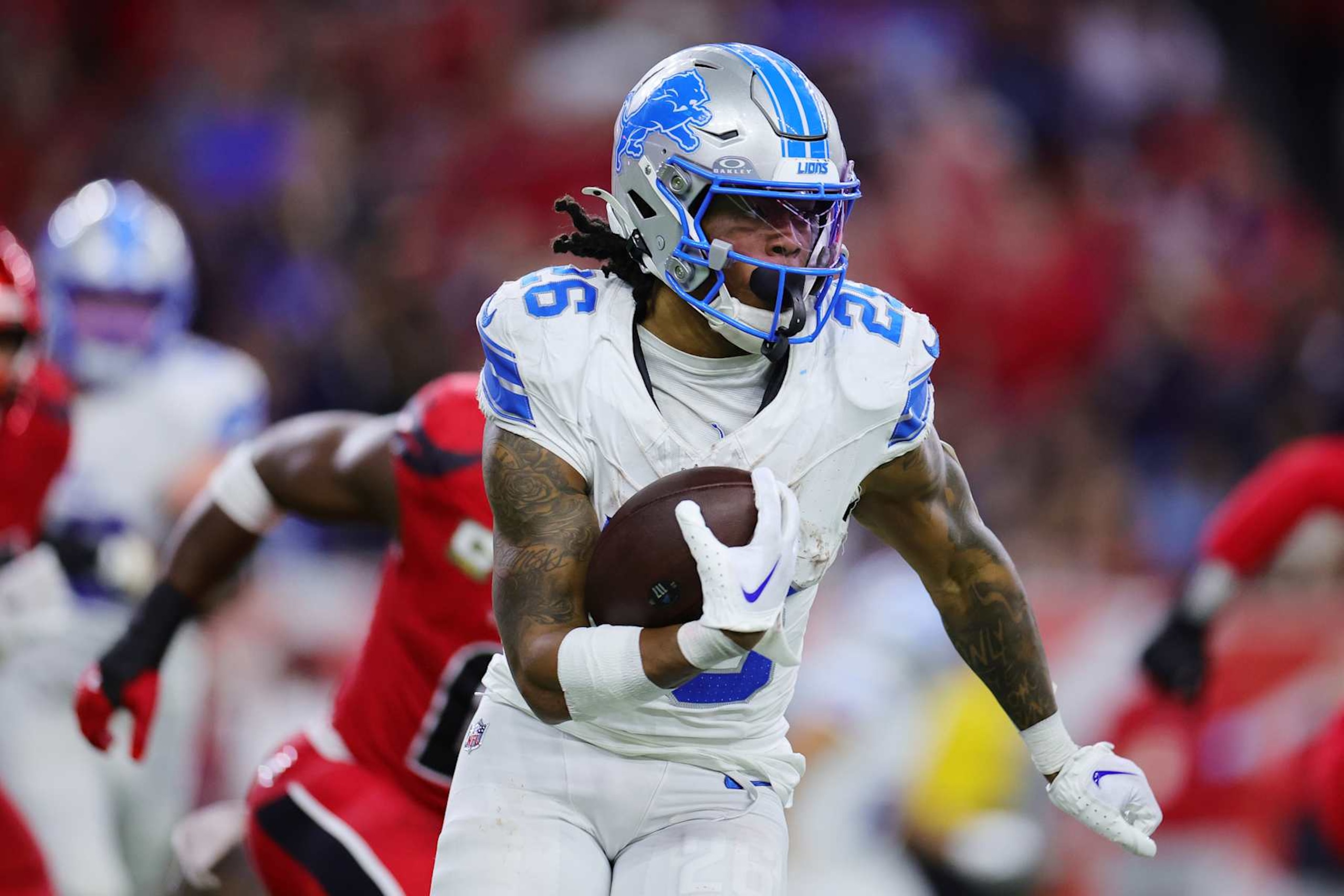 HOUSTON, TEXAS - NOVEMBER 10: Jahmyr Gibbs #26 of the Detroit Lions runs the ball against the Houston Texans at NRG Stadium on November 10, 2024 in Houston, Texas. (Photo by Alex Slitz/Getty Images)