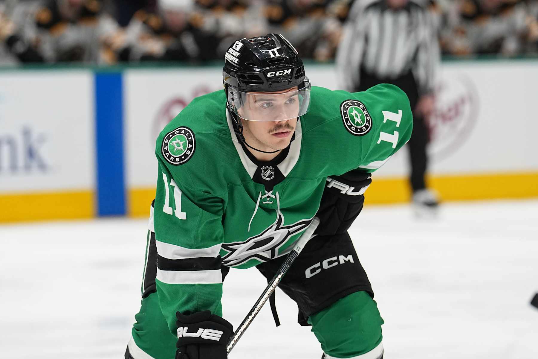 DALLAS, TX - NOVEMBER 14: Logan Stankoven #11 of the Dallas Stars lines up against the Boston Bruins at the American Airlines Center on November 14, 2024 in Dallas, Texas. (Photo by Glenn James/NHLI via Getty Images)
