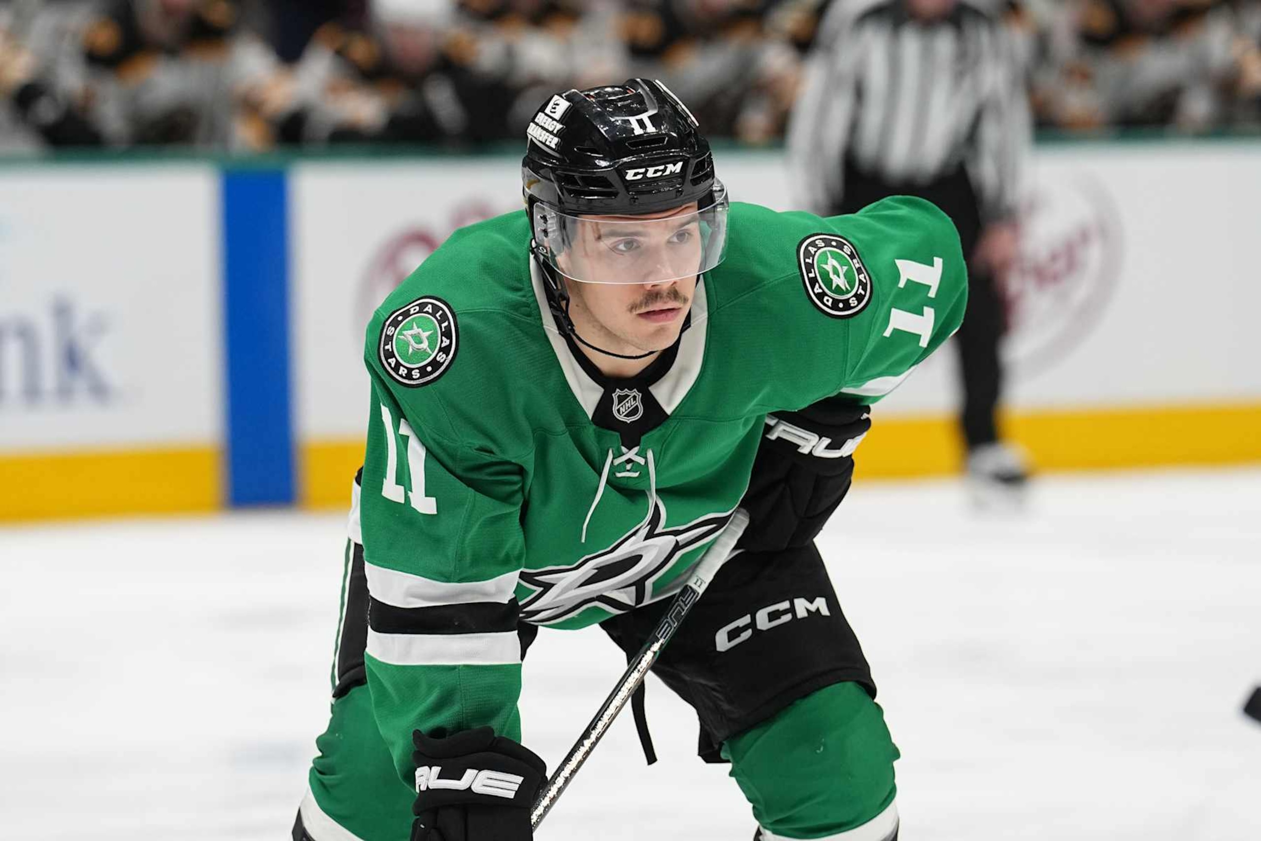 DALLAS, TX - NOVEMBER 14: Logan Stankoven #11 of the Dallas Stars lines up against the Boston Bruins at the American Airlines Center on November 14, 2024 in Dallas, Texas. (Photo by Glenn James/NHLI via Getty Images)