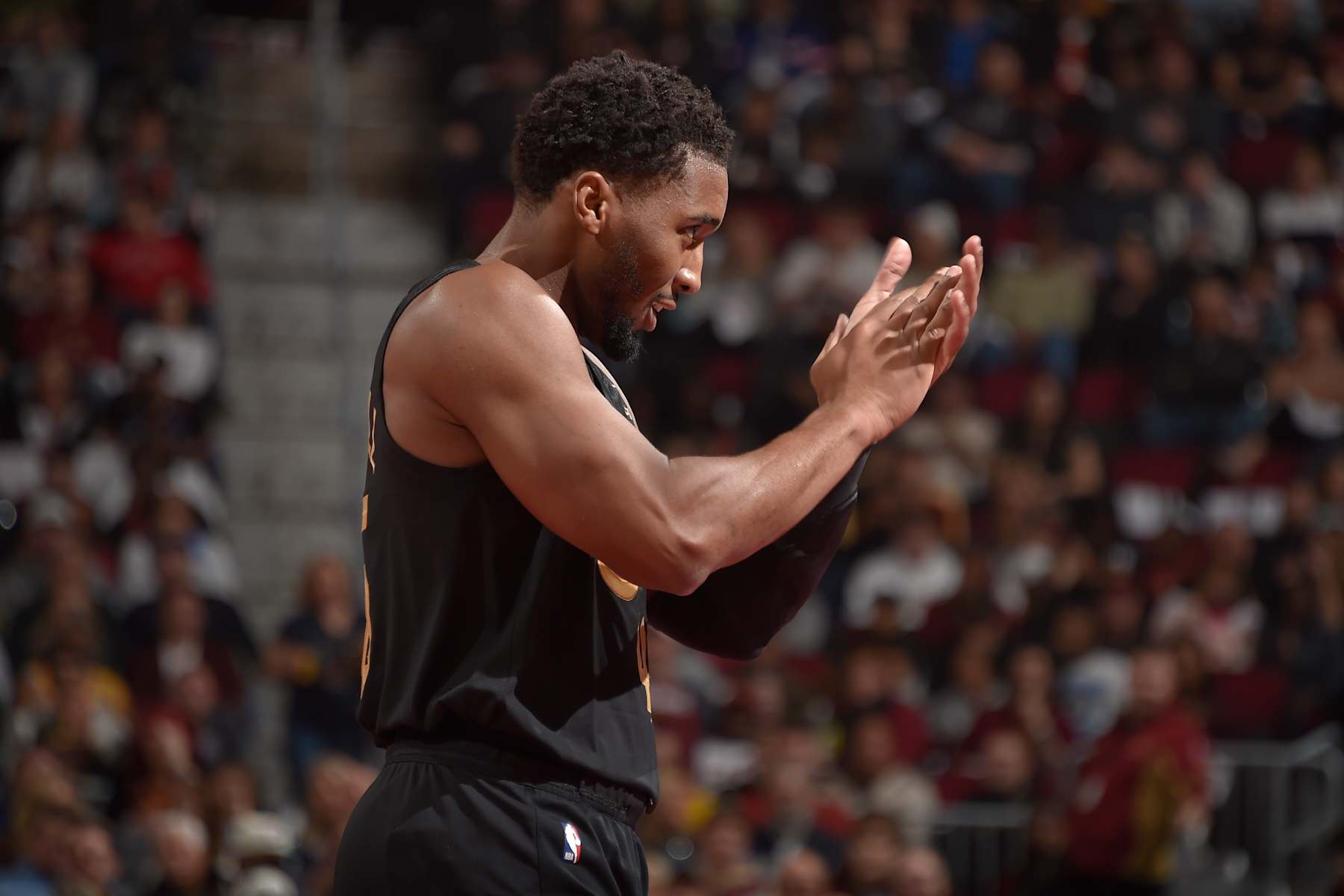 CLEVELAND, OH - November 15: Donovan Mitchell #45 of the Cleveland Cavaliers celebrates during the game against the Chicago Bulls during the Emirates NBA Cup game on November 15, 2024 at Rocket Mortgage FieldHouse in Cleveland, Ohio. NOTE TO USER: User expressly acknowledges and agrees that, by downloading and/or using this Photograph, user is consenting to the terms and conditions of the Getty Images License Agreement. Mandatory Copyright Notice: Copyright 2024 NBAE (Photo by David Liam Kyle/NBAE via Getty Images)