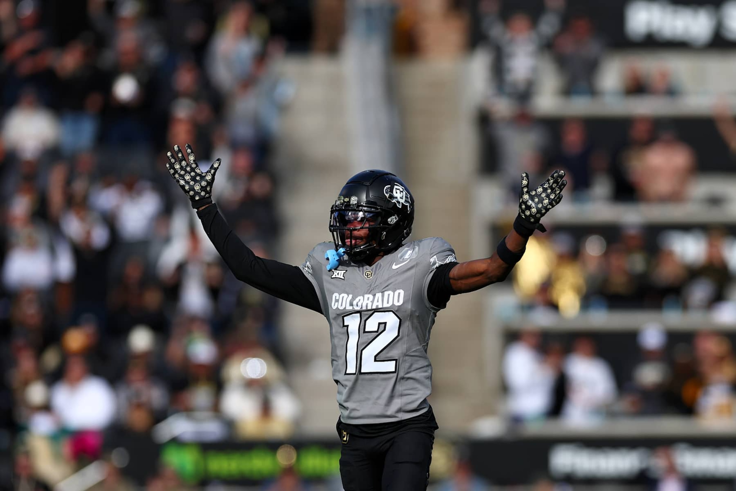 BOULDER, COLORADO - NOVEMBER 16: Travis Hunter #12 of the Colorado Buffaloes reacts after a touchdown against the Utah Utes during the second half at Folsom Field on November 16, 2024 in Boulder, Colorado. (Photo by Aaron M. Sprecher/Getty Images)
