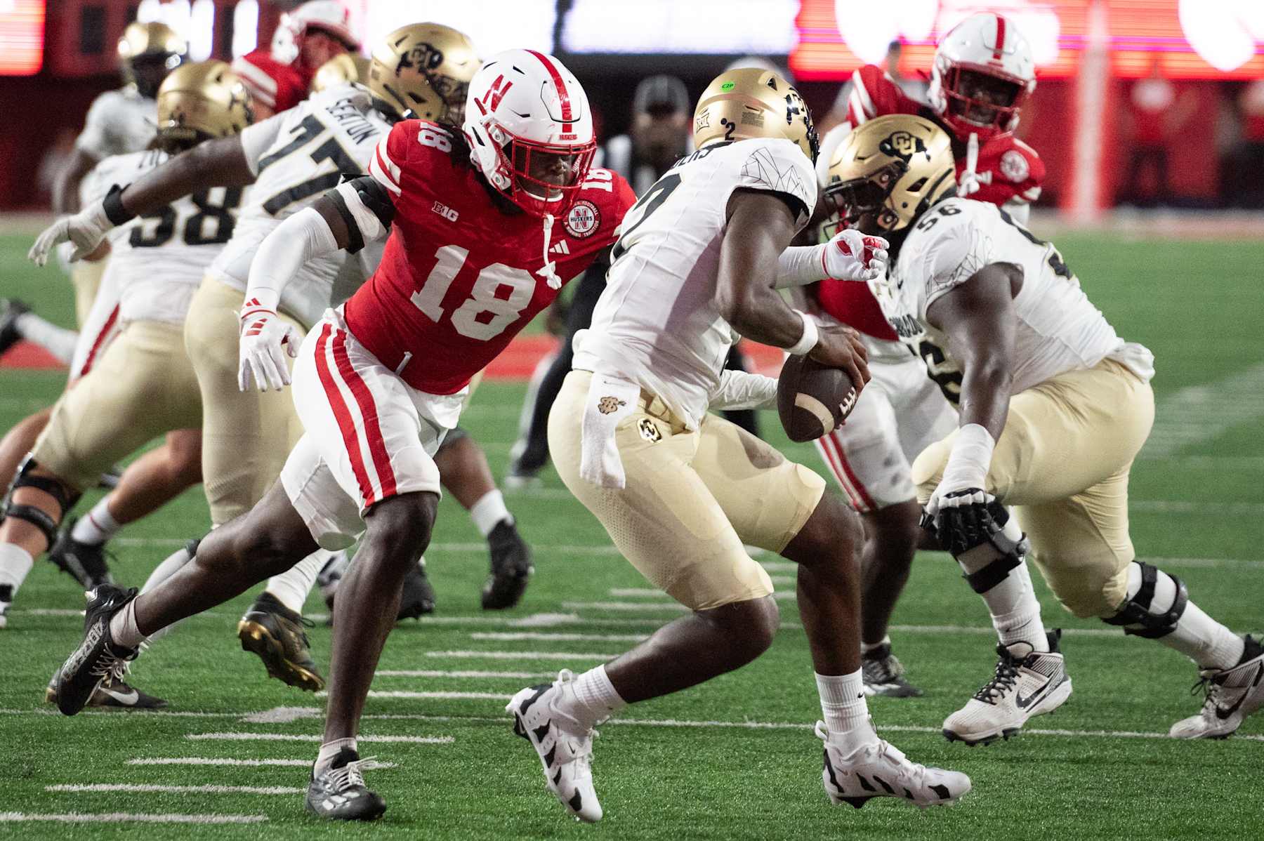 LINCOLN, NEBRASKA - SEPTEMBER 7: Princewill Umanmielen #18 of the Nebraska Cornhuskers sacks Shedeur Sanders #2 of the Colorado Buffaloes at Memorial Stadium on September 7, 2024 in Lincoln, Nebraska. (Photo by Steven Branscombe/Getty Images)