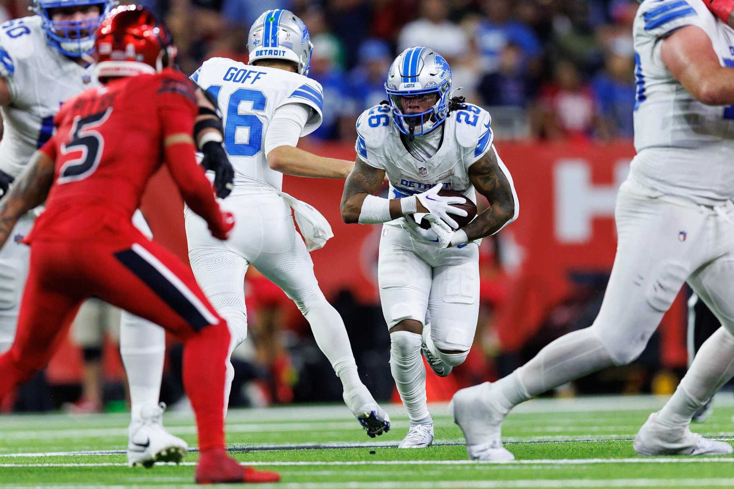HOUSTON, TEXAS - NOVEMBER 10: Running back Jahmyr Gibbs #26 of the Detroit Lions carries the ball during an NFL game against the Houston Texans at NRG Stadium on November 10, 2024 in Houston, Texas. (Photo by Brooke Sutton/Getty Images)