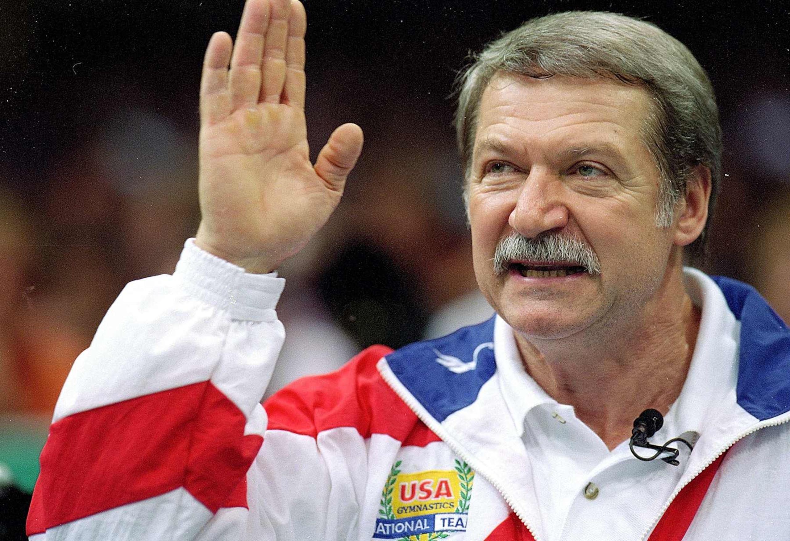 23 Jul 1996: Women's Coach Bela Karolyi waves during a gymnastics event at the Georgia Dome in the 1996 Olympic Games in Atlanta, Georgia. 23 Jul 1996: Women's Coach Bela Karolyi waves during a gymnastics event at the Georgia Dome in the 1996 Olympic Games in Atlanta, Georgia.