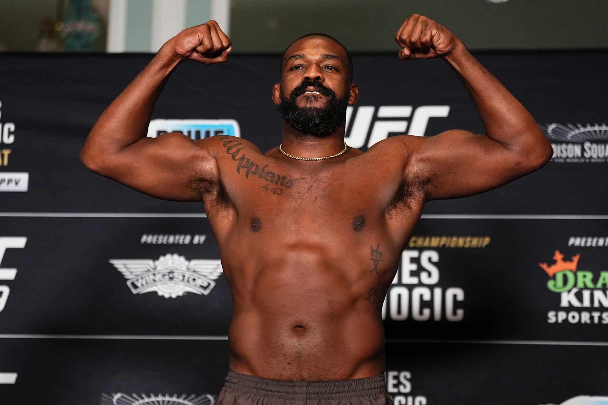 NEW YORK, NEW YORK - NOVEMBER 15: Jon Jones poses on the scale during the UFC 309 official weigh-in at the New York Hilton Midtown on November 15, 2024 in New York City. (Photo by Jeff Bottari/Zuffa LLC)