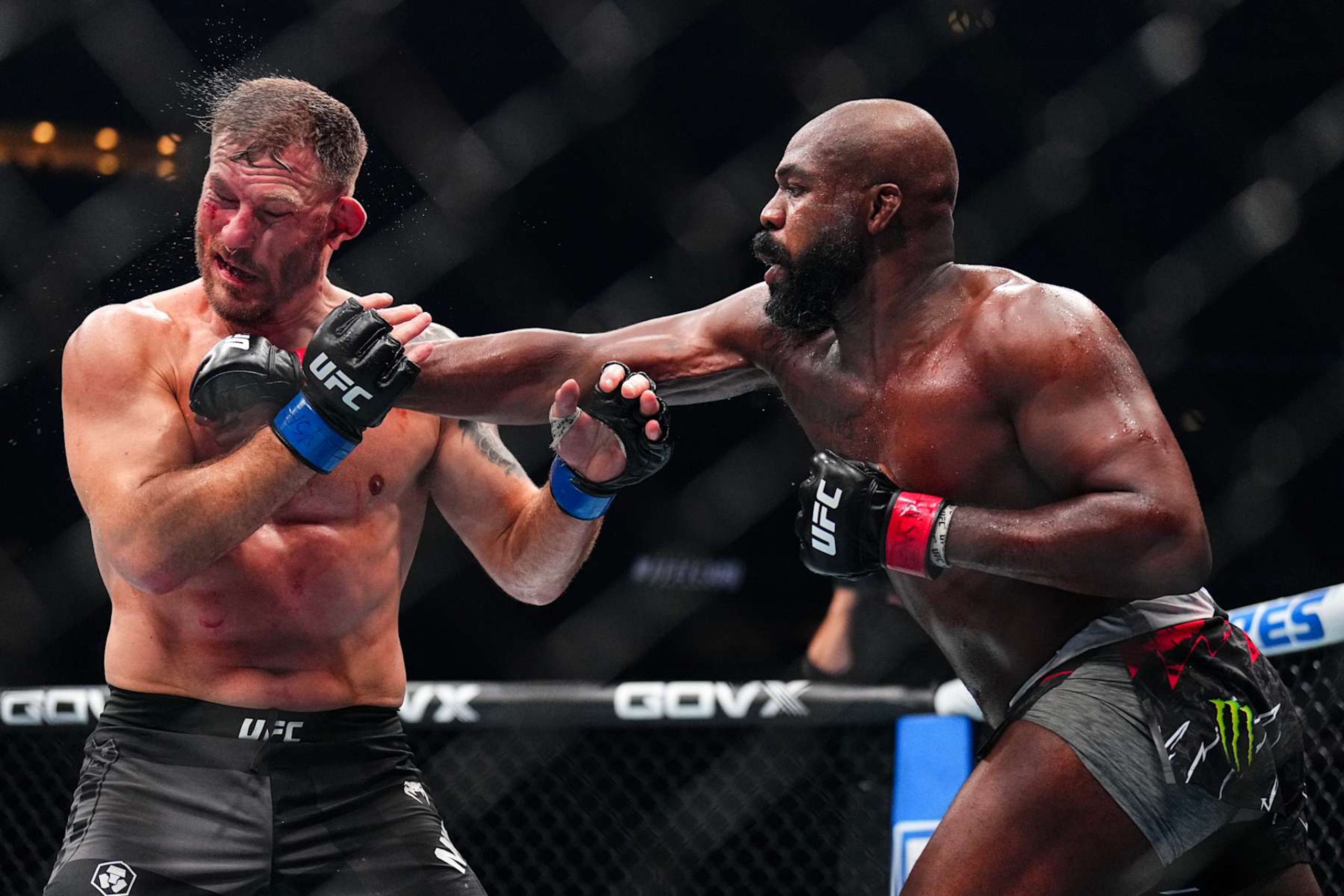NEW YORK, NEW YORK - NOVEMBER 16: (R-L) Jon Jones of the United States of America punches Stipe Miocic of the United States of America in the UFC light heavyweight championship fight during the UFC 309 event at Madison Square Garden on November 16, 2024 in New York City. (Photo by Chris Unger/Zuffa LLC)