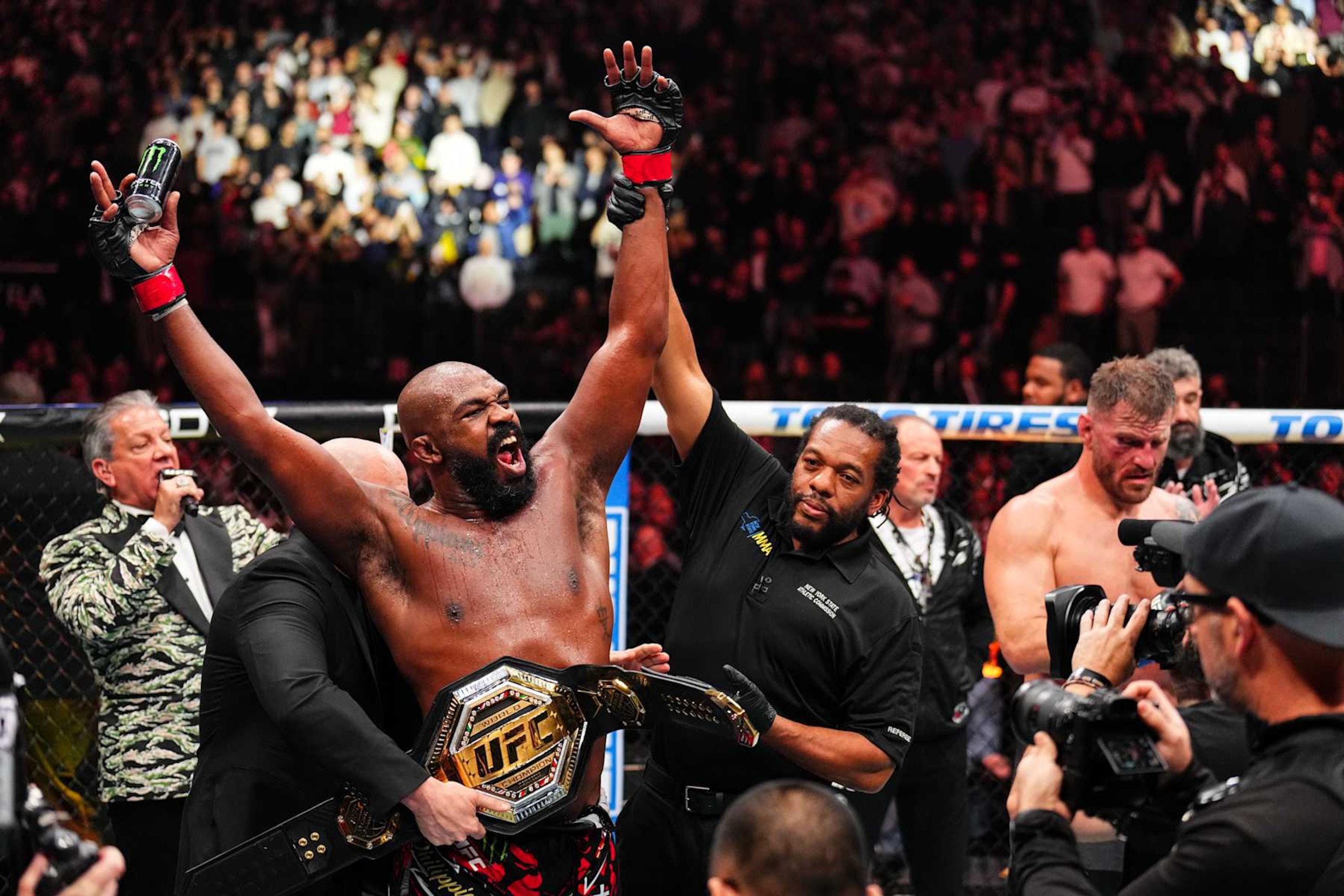 Jon Jones reacts after his TKO victory against Stipe Miocic