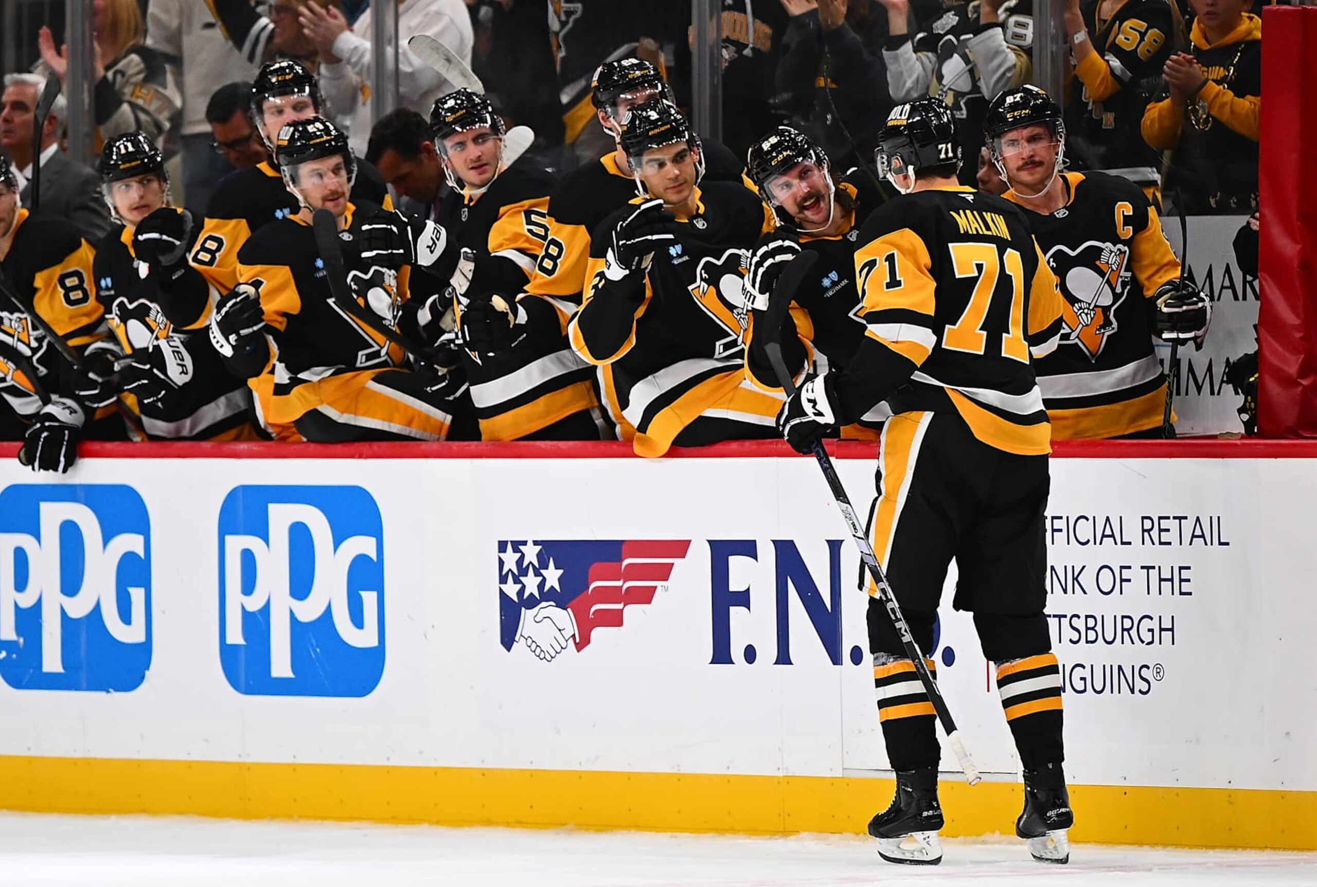PITTSBURGH, PA - NOVEMBER 16: Evgeni Malkin #71 of the Pittsburgh Penguins celebrates with the bench after scoring on his shootout attempt against the San Jose Sharks at PPG PAINTS Arena on November 16, 2024 in Pittsburgh, Pennsylvania. (Photo by Joe Sargent/NHLI via Getty Images) PITTSBURGH, PA - NOVEMBER 16: Evgeni Malkin #71 of the Pittsburgh Penguins celebrates with the bench after scoring on his shootout attempt against the San Jose Sharks at PPG PAINTS Arena on November 16, 2024 in Pittsburgh, Pennsylvania. (Photo by Joe Sargent/NHLI via Getty Images)