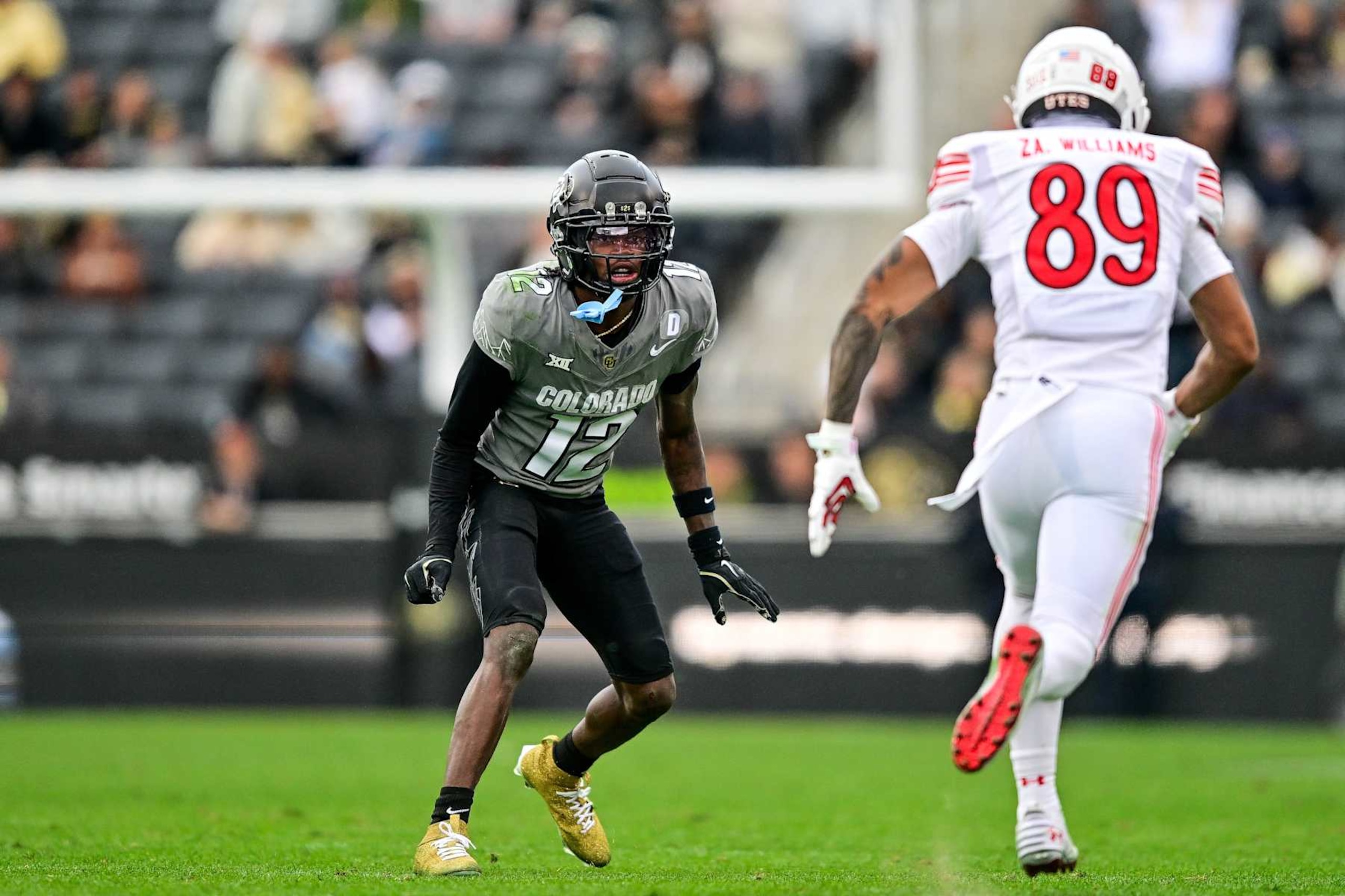 BOULDER, CO - NOVEMBER 16: Travis Hunter #12 of the Colorado Buffaloes lines up on defense in the fourth quarter against the Colorado Buffaloes at Folsom Field on November 16, 2024 in Boulder, Colorado. (Photo by Dustin Bradford/Getty Images) BOULDER, CO - NOVEMBER 16: Travis Hunter #12 of the Colorado Buffaloes lines up on defense in the fourth quarter against the Colorado Buffaloes at Folsom Field on November 16, 2024 in Boulder, Colorado. (Photo by Dustin Bradford/Getty Images)