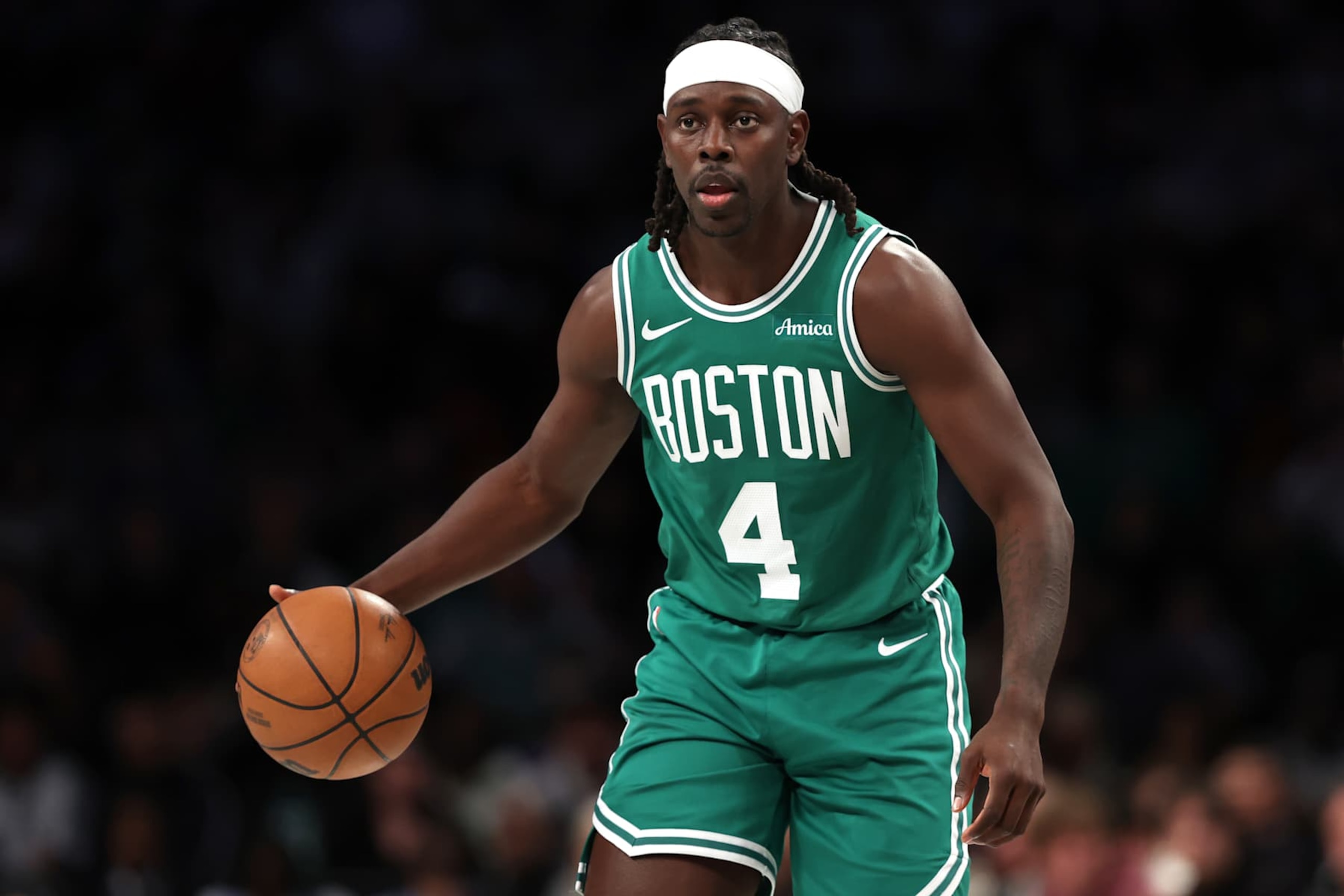 NEW YORK, NEW YORK - NOVEMBER 13: Jrue Holiday #4 of the Boston Celtics dribbles the ball against the Brooklyn Nets during the fourth quarter at the Barclays Center on November 13, 2024 in the Brooklyn borough of New York City. NOTE TO USER: User expressly acknowledges and agrees that, by downloading and or using this photograph, User is consenting to the terms and conditions of the Getty Images License Agreement.  (Photo by Sarah Stier/Getty Images)