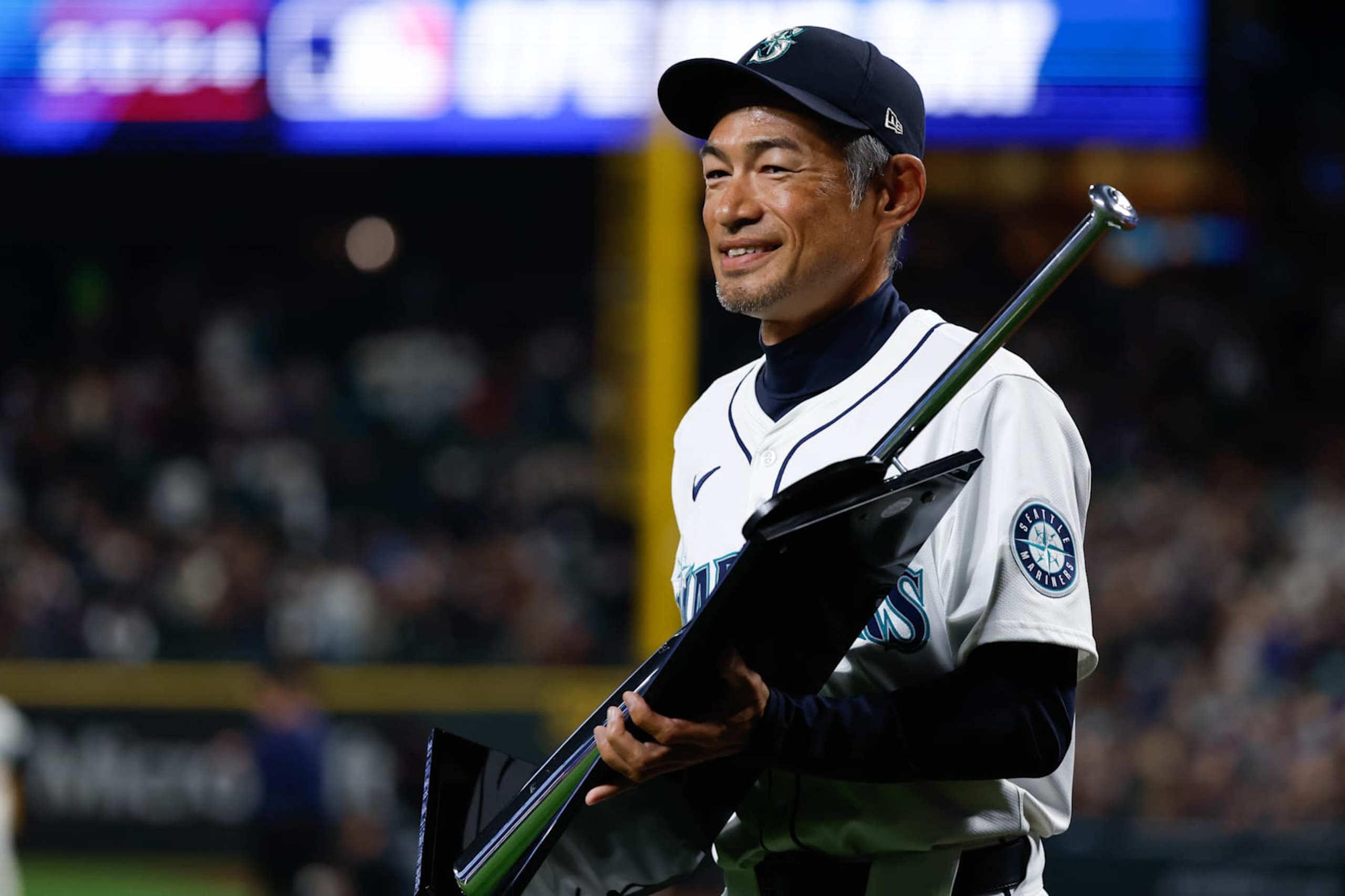 SEATTLE, WA - MARCH 28:  Ichiro Suzuki presents the Silver Slugger award to Julio Rodriguez #44 of the Seattle Mariners prior to the game between the Boston Red Sox and the Seattle Mariners at T-Mobile Park on Thursday, March 28, 2024 in Seattle, Washington. (Photo by Joe Nicholson/MLB Photos via Getty Images)