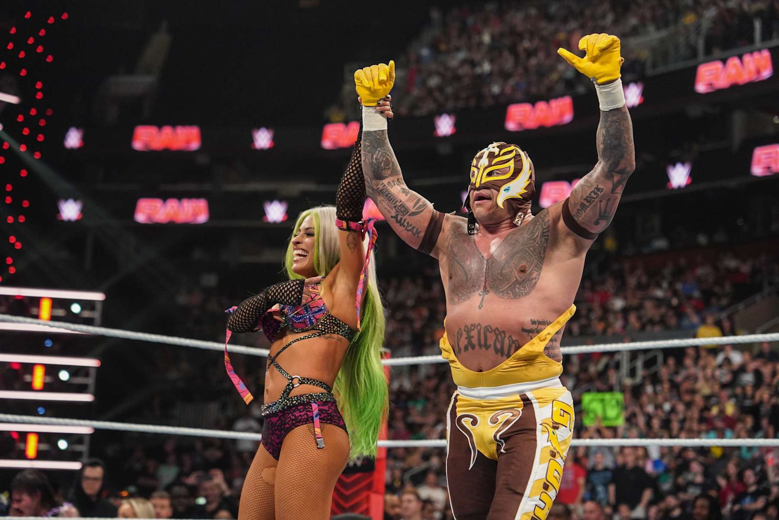 BOSTON, MASSACHUSETTS - JULY 1: Zelina Vega and Rey Mysterio celebrate during Monday Night RAW at TD Garden on July 1, 2024 in Boston, Massachusetts. (Photo by WWE/Getty Images) BOSTON, MASSACHUSETTS - JULY 1: Zelina Vega and Rey Mysterio celebrate during Monday Night RAW at TD Garden on July 1, 2024 in Boston, Massachusetts. (Photo by WWE/Getty Images)