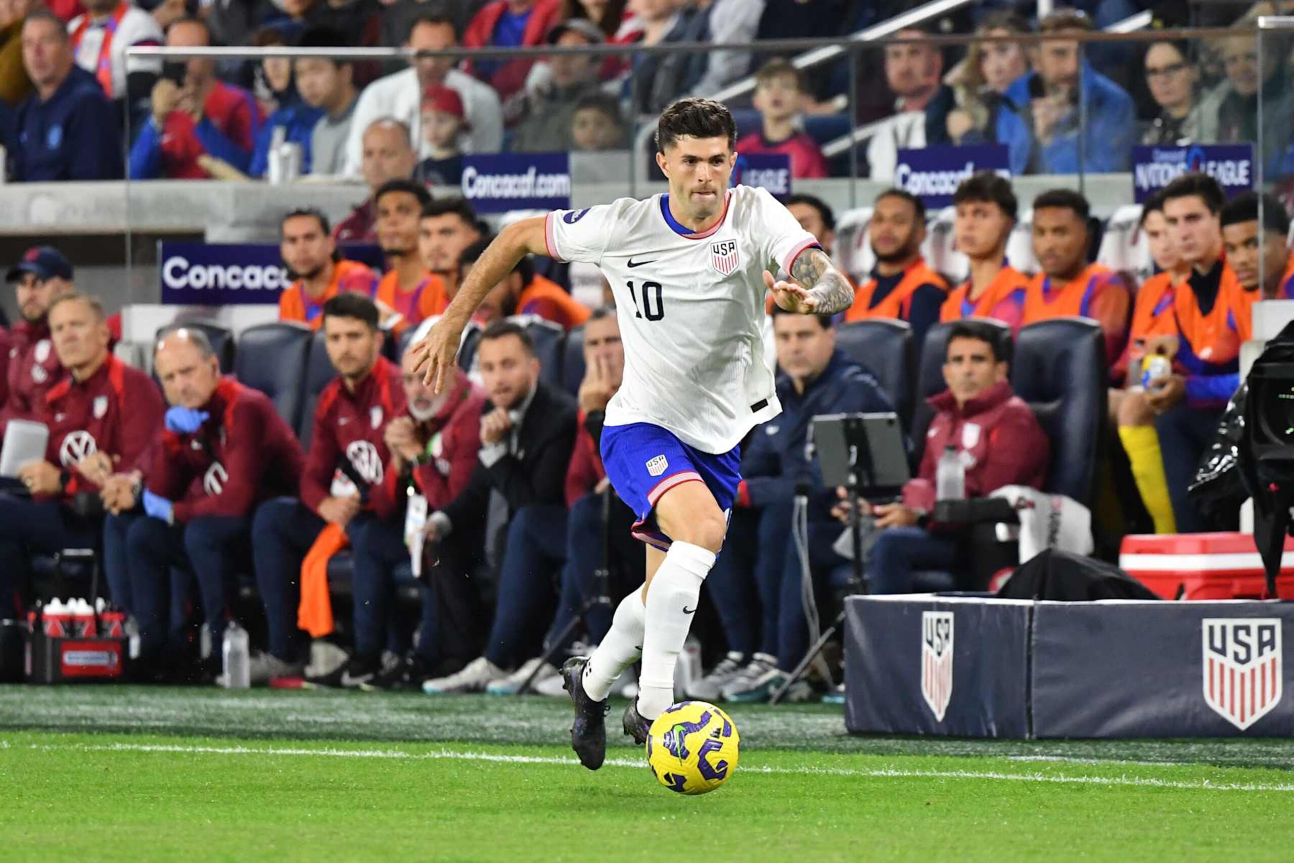 ST LOUIS, MISSOURI - NOVEMBER 18: Christian Pulisic #10 of the United States advances the ball during the first half against Jamaica during leg two of the 2024 Concacaf Nations League Quarterfinals at Citypark on November 18, 2024 in St Louis, Missouri. (Photo by Bill Barrett/ISI Photos/USSF/Getty Images for USSF) ST LOUIS, MISSOURI - NOVEMBER 18: Christian Pulisic #10 of the United States advances the ball during the first half against Jamaica during leg two of the 2024 Concacaf Nations League Quarterfinals at Citypark on November 18, 2024 in St Louis, Missouri. (Photo by Bill Barrett/ISI Photos/USSF/Getty Images for USSF)