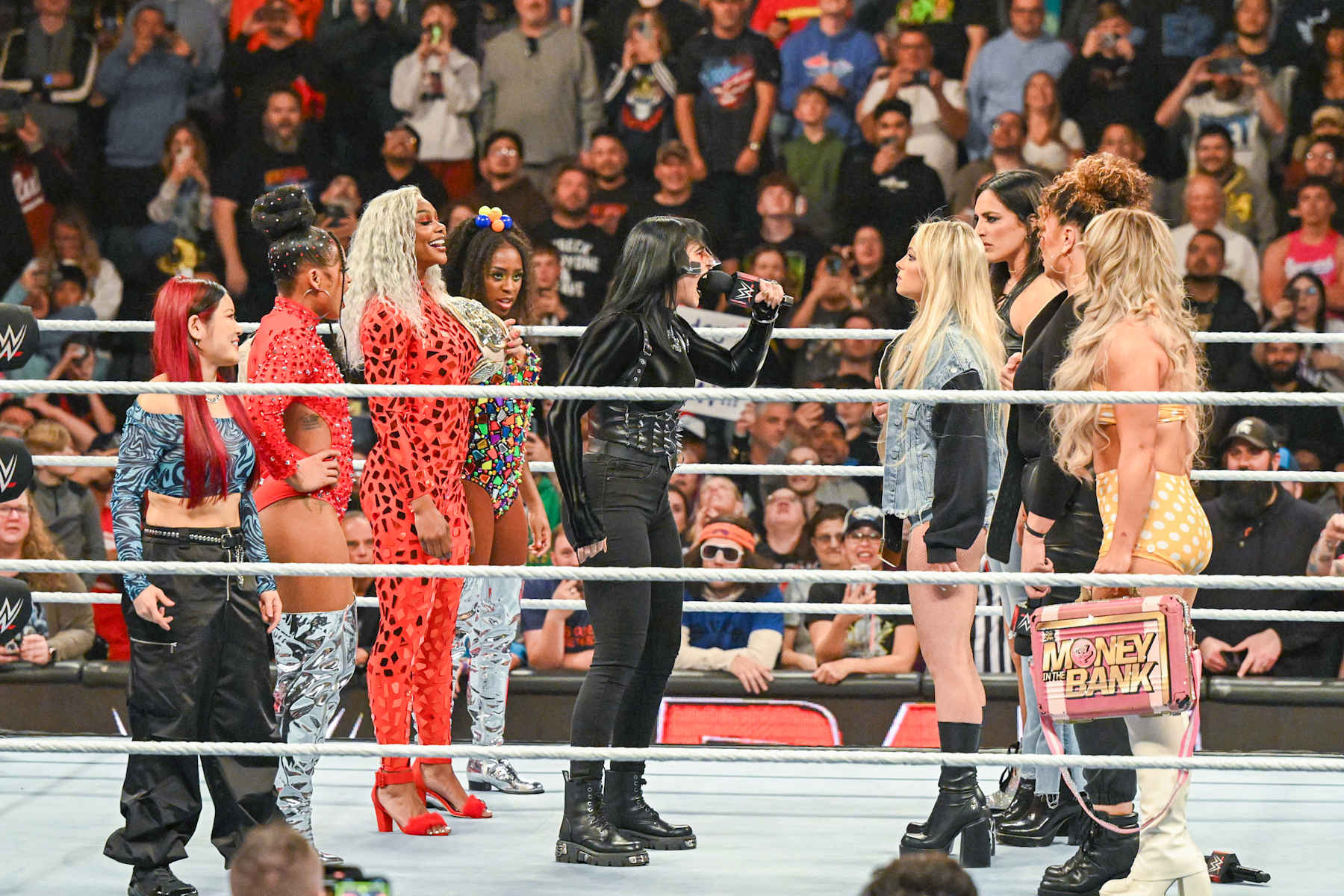 GRAND RAPIDS, MICHIGAN - NOVEMBER 18: Rhea Ripley confronts the Women's World Champion, Liv Morgan during Monday Night RAW at Van Andel Arena on November 18, 2024 in Grand Rapids, Michigan.  (Photo by WWE/Getty Images)