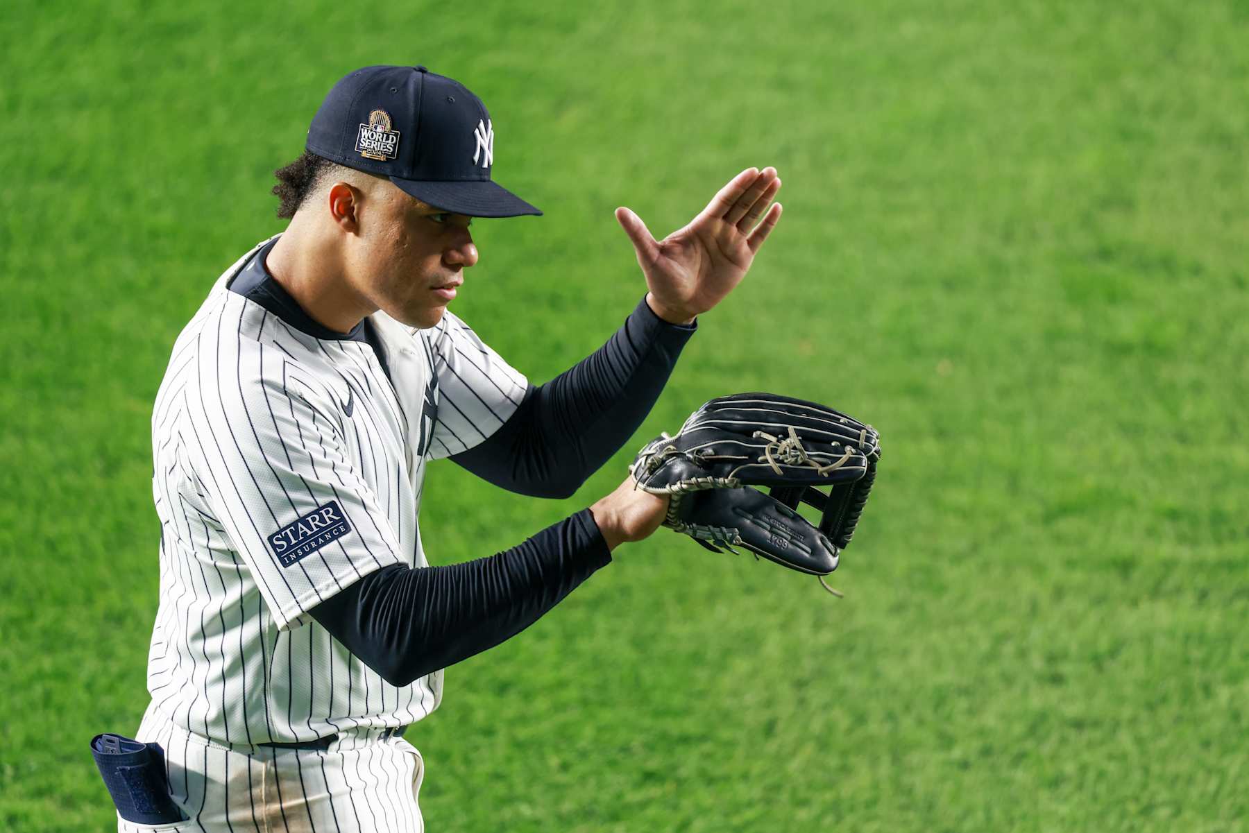 NEW YORK, NY - OCTOBER 30: Juan Soto #22 of the New York Yankees celebrates a catch by Aaron Judge in the fourth inning during Game 5 of the 2024 World Series presented by Capital One between the Los Angeles Dodgers and the New York Yankees at Yankee Stadium on Wednesday, October 30, 2024 in New York, New York. (Photo by Dustin Satloff/MLB Photos via Getty Images)