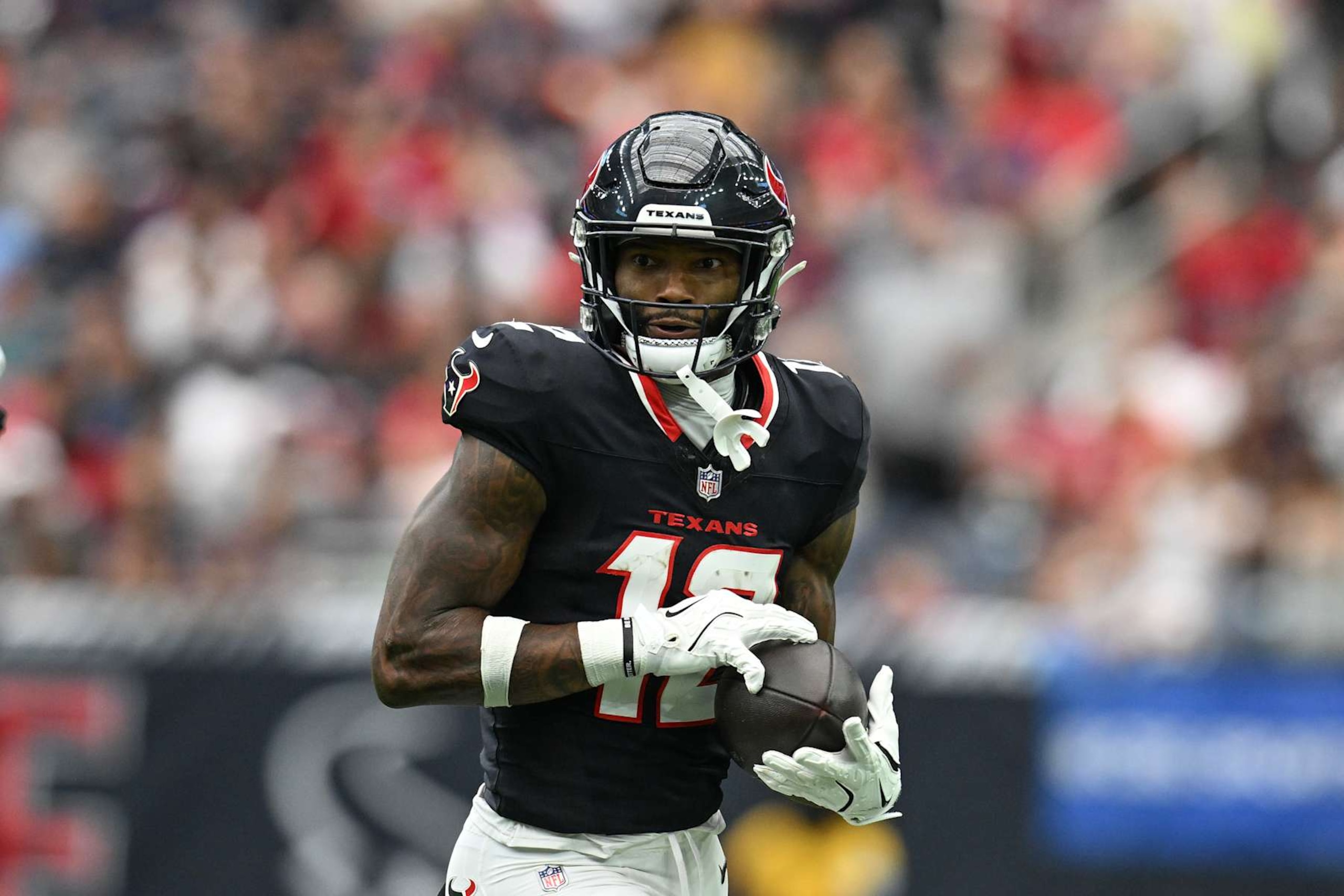 HOUSTON, TEXAS - SEPTEMBER 29: Nico Collins #12 of the Houston Texans runs after catching a pass during the second quarter of the game against the Jacksonville Jaguars at NRG Stadium on September 29, 2024 in Houston, Texas. (Photo by Jack Gorman/Getty Images) HOUSTON, TEXAS - SEPTEMBER 29: Nico Collins #12 of the Houston Texans runs after catching a pass during the second quarter of the game against the Jacksonville Jaguars at NRG Stadium on September 29, 2024 in Houston, Texas. (Photo by Jack Gorman/Getty Images)