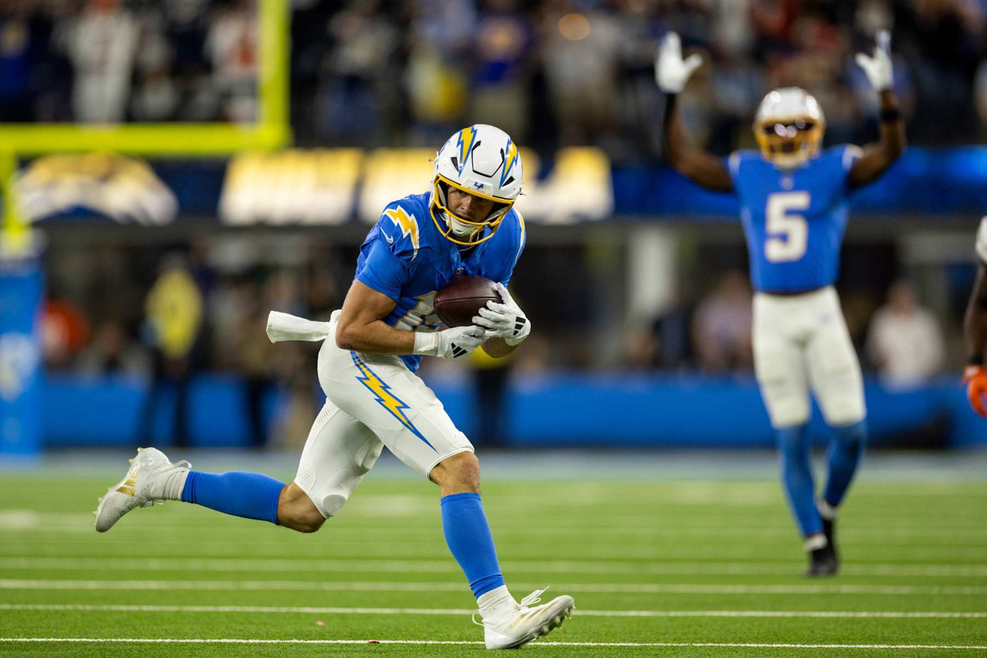 INGLEWOOD, CALIFORNIA - NOVEMBER 17: Ladd McConkey #15 of the Los Angeles Chargers completes a catch and runs with the ball during an NFL Football game against the Cincinnati Bengals at SoFi Stadium on November 17, 2024 in Inglewood, California. (Photo by Michael Owens/Getty Images)