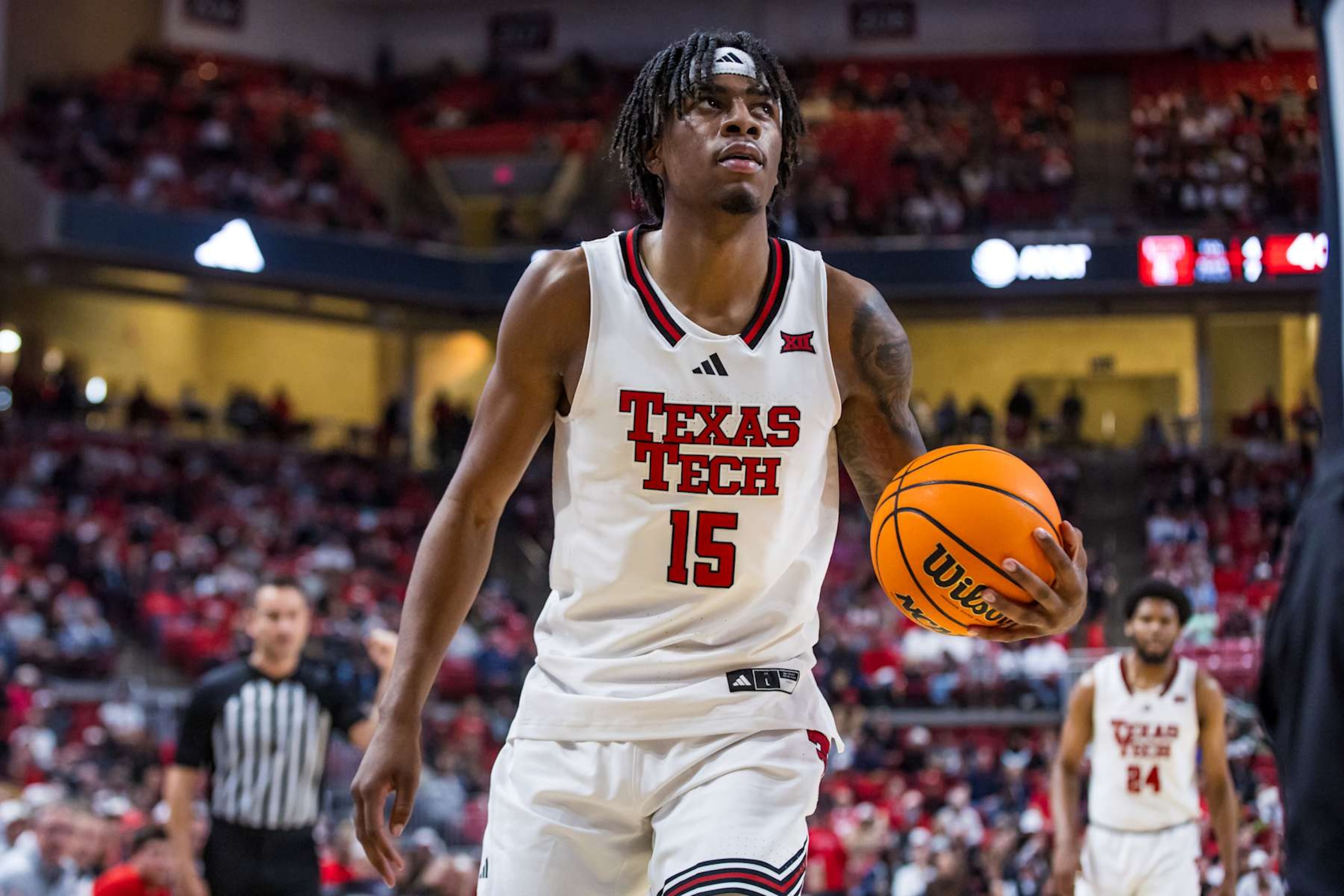 LUBBOCK, TEXAS - NOVEMBER 13: JT Toppin #15 of the Texas Tech Red Raiders reacts after being fouled during the first half of the game against the Wyoming Cowboys at United Supermarkets Arena on November 13, 2024 in Lubbock, Texas. (Photo by John E. Moore III/Getty Images)