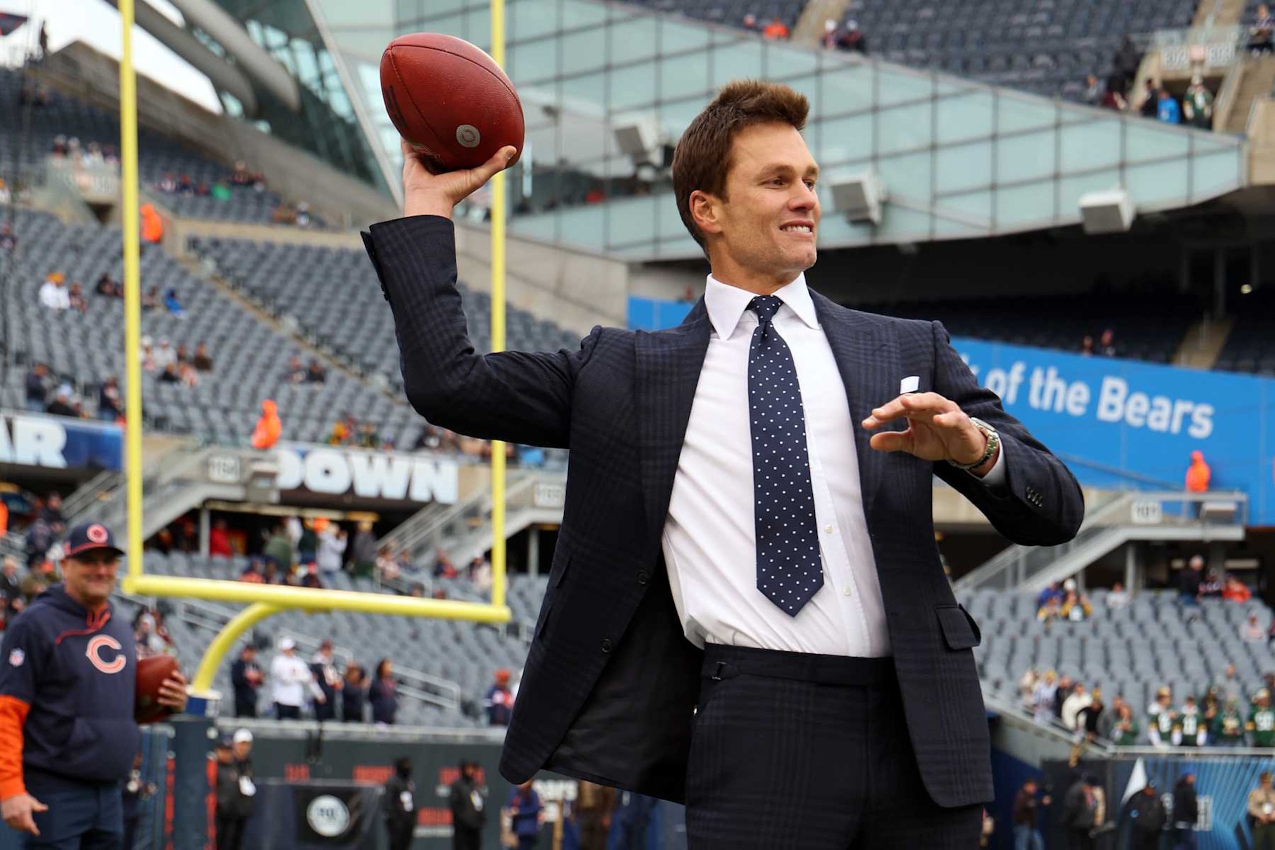 CHICAGO, ILLINOIS - NOVEMBER 17: Former NFL player Tom Brady throws a pass prior to a game between the Chicago Bears and the Green Bay Packers at Soldier Field on November 17, 2024 in Chicago, Illinois. (Photo by Michael Reaves/Getty Images)