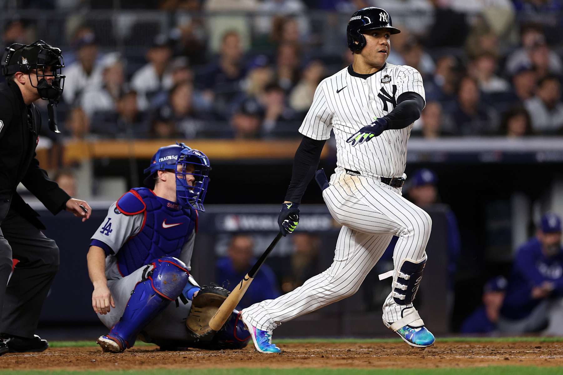 NEW YORK, NEW YORK - OCTOBER 30:  Juan Soto #22 of the New York Yankees hits a single during the fourth inning of Game Five of the 2024 World Series against the Los Angeles Dodgers at Yankee Stadium on October 30, 2024 in the Bronx borough of New York City. (Photo by Elsa/Getty Images)