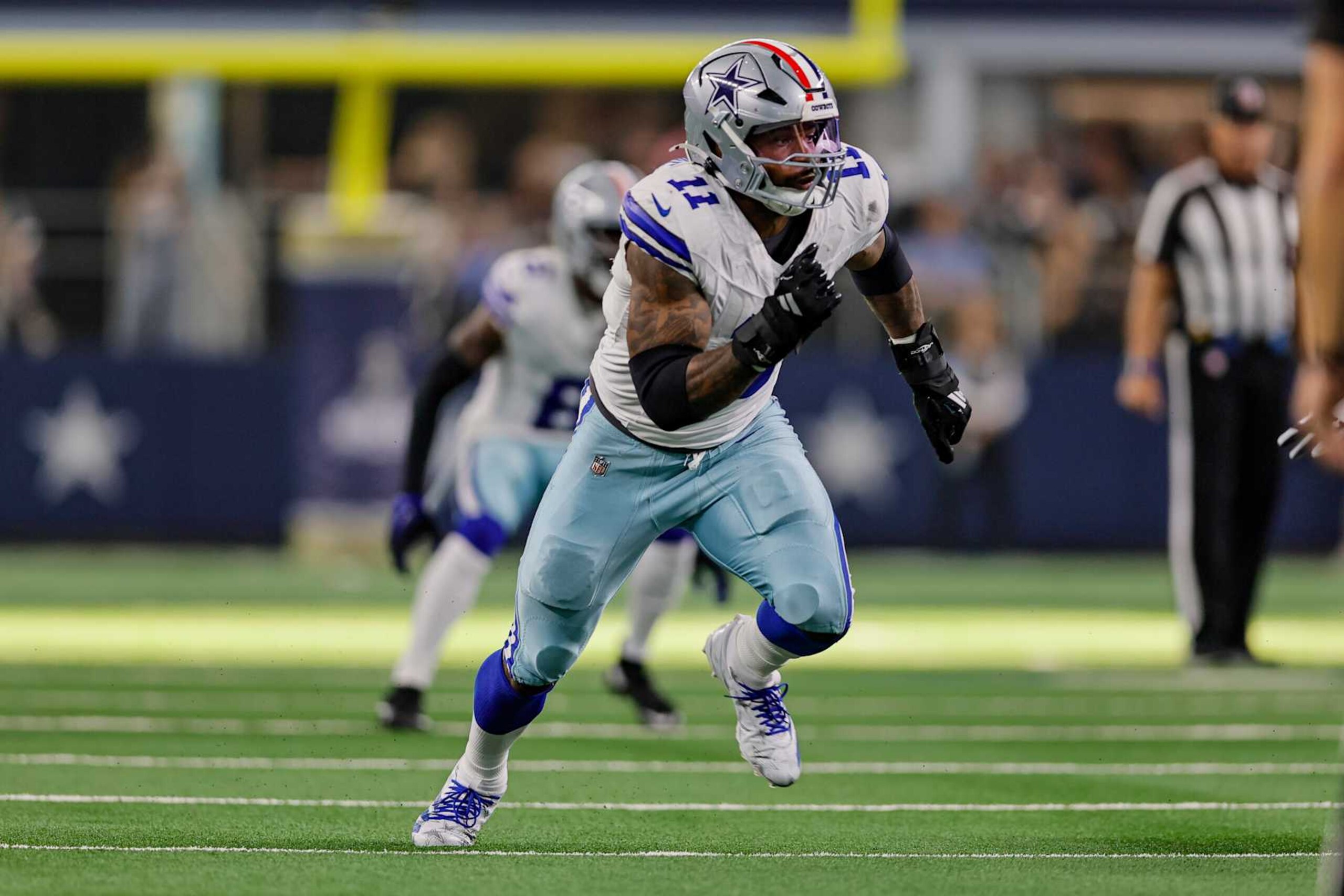 ARLINGTON, TX - NOVEMBER 10: Dallas Cowboys linebacker Micah Parsons (11) charges into the backfield during the game between the Dallas Cowboys and the Philadelphia Eagles on November 10, 2024 at AT&T Stadium in Arlington, Texas. (Photo by Matthew Pearce/Icon Sportswire via Getty Images)