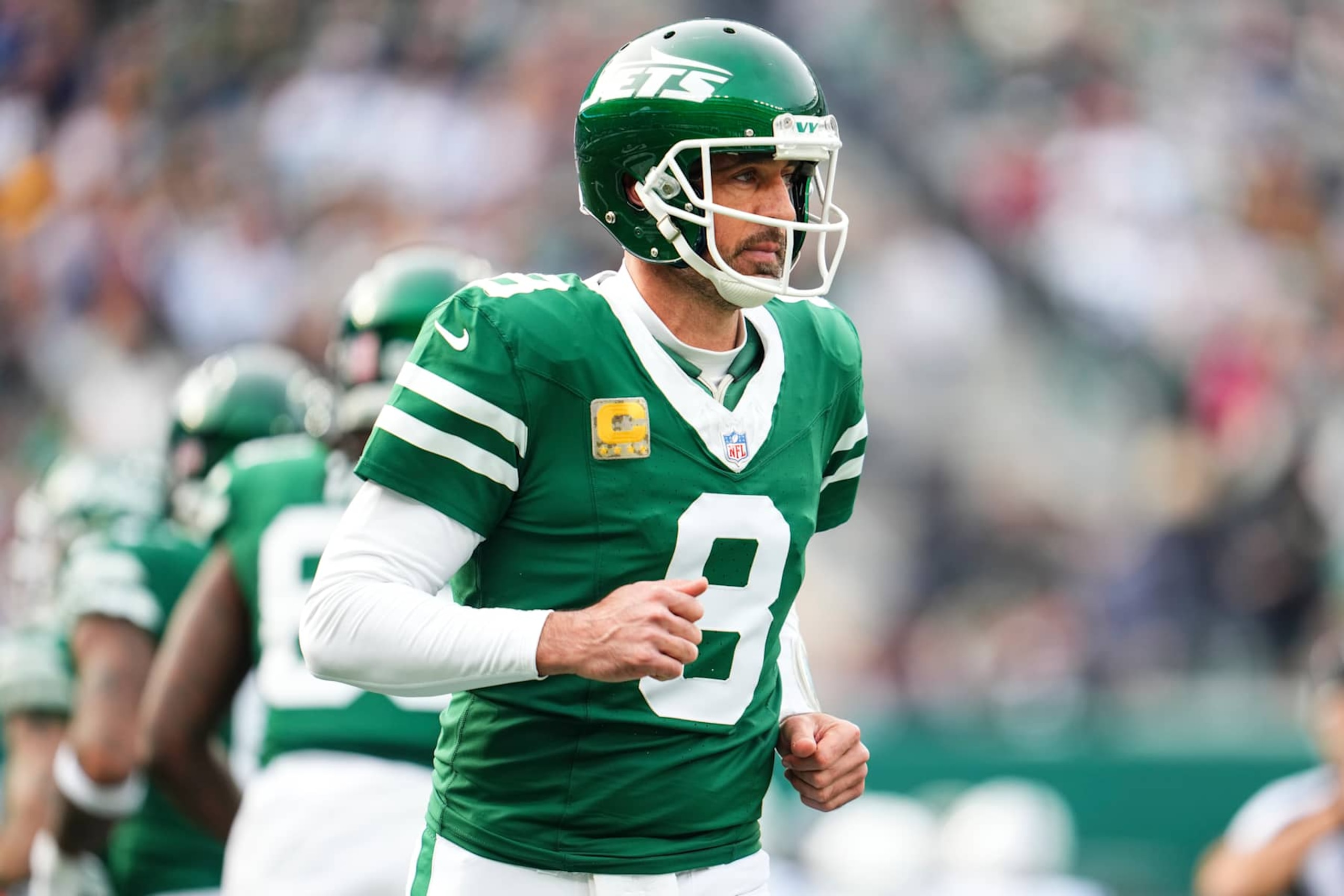 EAST RUTHERFORD, NJ - NOVEMBER 17: Aaron Rodgers #8 of the New York Jets looks on from the field during an NFL football game against the Indianapolis Colts at MetLife Stadium on November 17, 2024 in East Rutherford, New Jersey. (Photo by Cooper Neill/Getty Images) EAST RUTHERFORD, NJ - NOVEMBER 17: Aaron Rodgers #8 of the New York Jets looks on from the field during an NFL football game against the Indianapolis Colts at MetLife Stadium on November 17, 2024 in East Rutherford, New Jersey. (Photo by Cooper Neill/Getty Images)