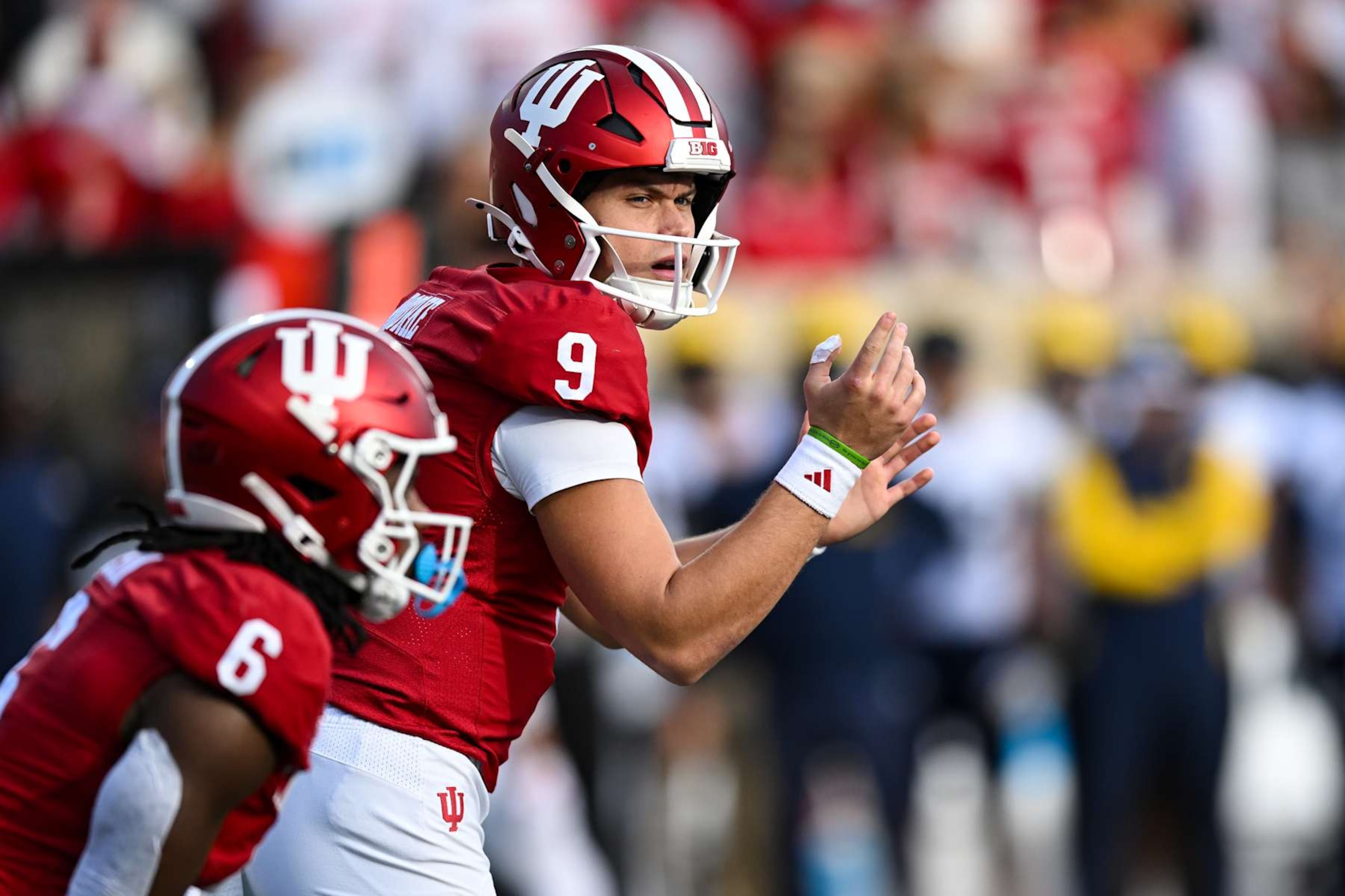 BLOOMINGTON, IN - NOVEMBER 09: Indiana Hoosiers QB Kurtis Rourke (9) during a college football game between the Michigan Wolverines and Indiana Hoosiers on November 9, 2024 at Memorial Stadium in Bloomington, IN (Photo by James Black/Icon Sportswire via Getty Images) BLOOMINGTON, IN - NOVEMBER 09: Indiana Hoosiers QB Kurtis Rourke (9) during a college football game between the Michigan Wolverines and Indiana Hoosiers on November 9, 2024 at Memorial Stadium in Bloomington, IN (Photo by James Black/Icon Sportswire via Getty Images)