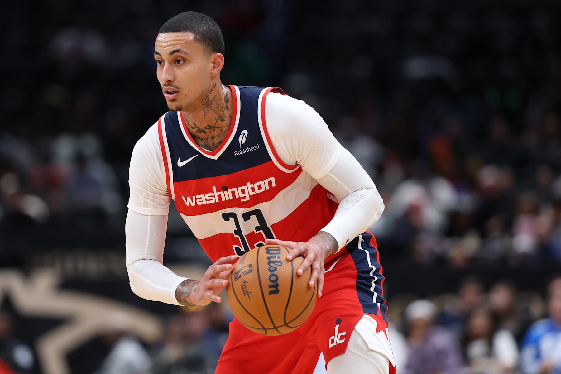 WASHINGTON, DC - NOVEMBER 17: Kyle Kuzma #33 of the Washington Wizards dribbles the ball against the Detroit Pistons during the first half at Capital One Arena on November 17, 2024 in Washington, DC. NOTE TO USER: User expressly acknowledges and agrees that, by downloading and or using this photograph, User is consenting to the terms and conditions of the Getty Images License Agreement. (Photo by Patrick Smith/Getty Images)