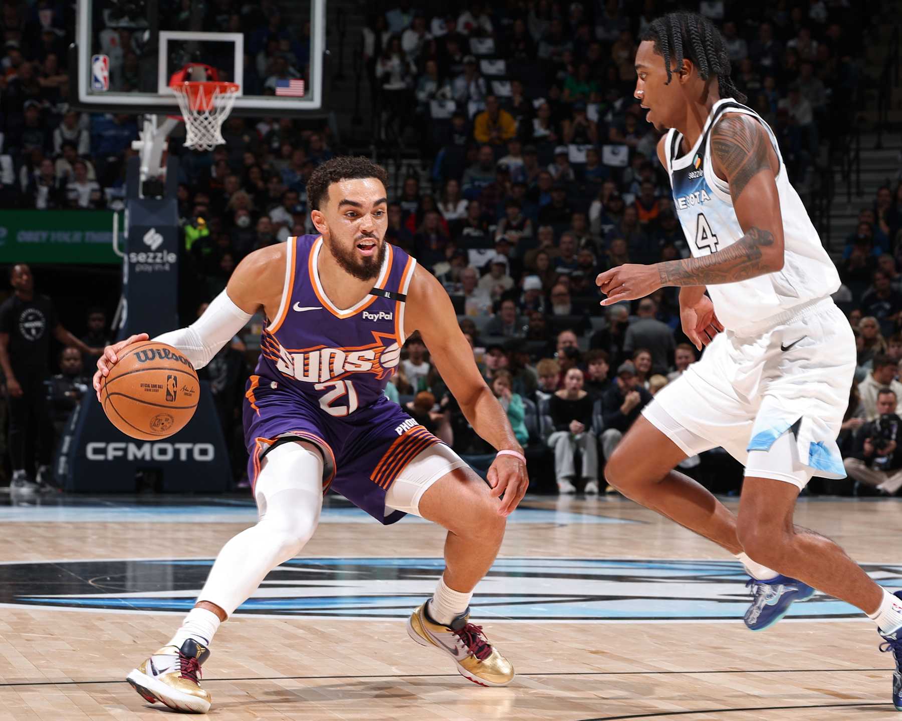 MINNEAPOLIS, MN - NOVEMBER 17: Tyus Jones #21 of the Phoenix Suns handles the ball during the game against the Minnesota Timberwolves on November 17, 2024 at Target Center in Minneapolis, Minnesota. NOTE TO USER: User expressly acknowledges and agrees that, by downloading and or using this Photograph, user is consenting to the terms and conditions of the Getty Images License Agreement. Mandatory Copyright Notice: Copyright 2024 NBAE(Photo by David Sherman/NBAE via Getty Images)