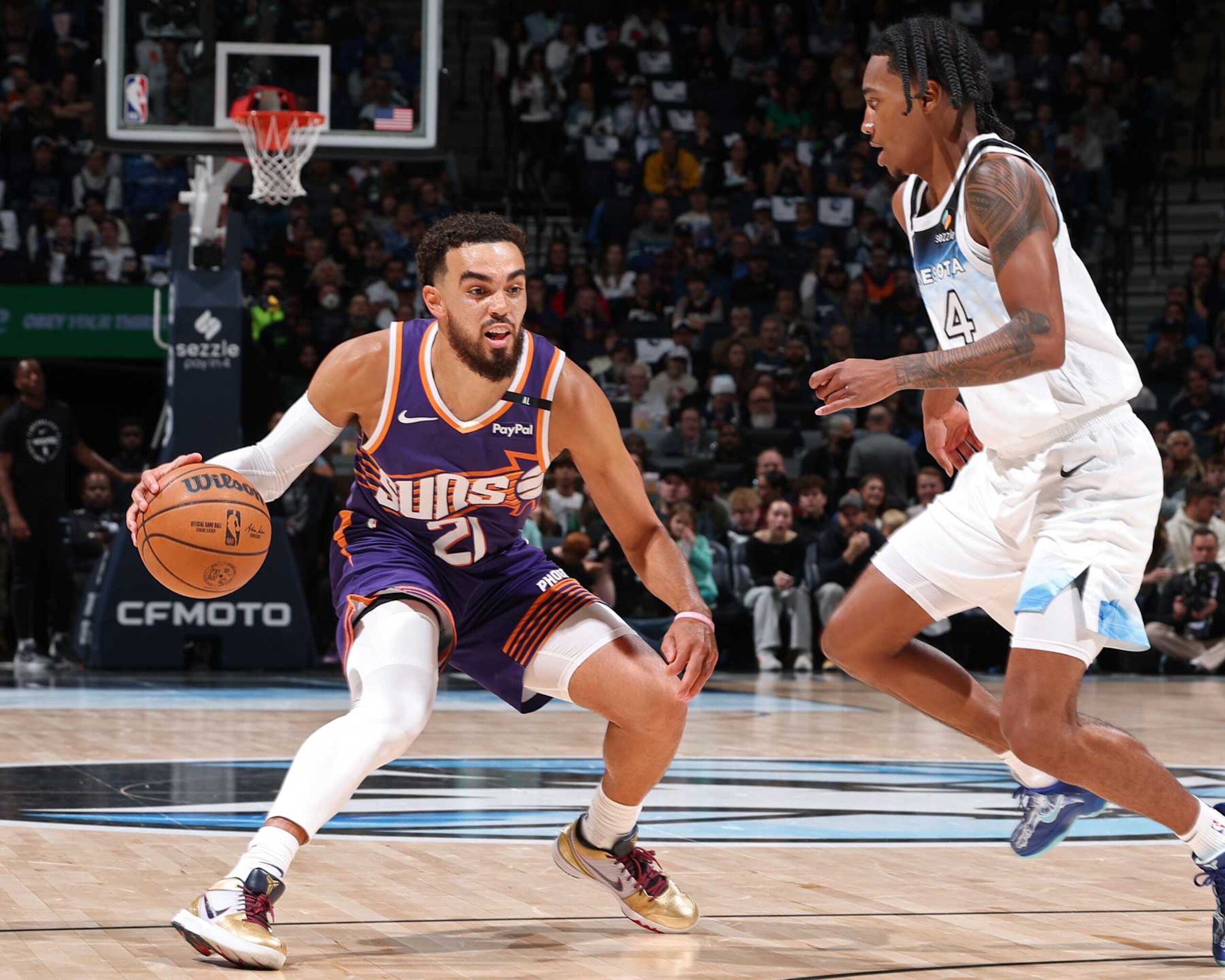 MINNEAPOLIS, MN - NOVEMBER 17: Tyus Jones #21 of the Phoenix Suns handles the ball during the game against the Minnesota Timberwolves on November 17, 2024 at Target Center in Minneapolis, Minnesota. NOTE TO USER: User expressly acknowledges and agrees that, by downloading and or using this Photograph, user is consenting to the terms and conditions of the Getty Images License Agreement. Mandatory Copyright Notice: Copyright 2024 NBAE(Photo by David Sherman/NBAE via Getty Images)