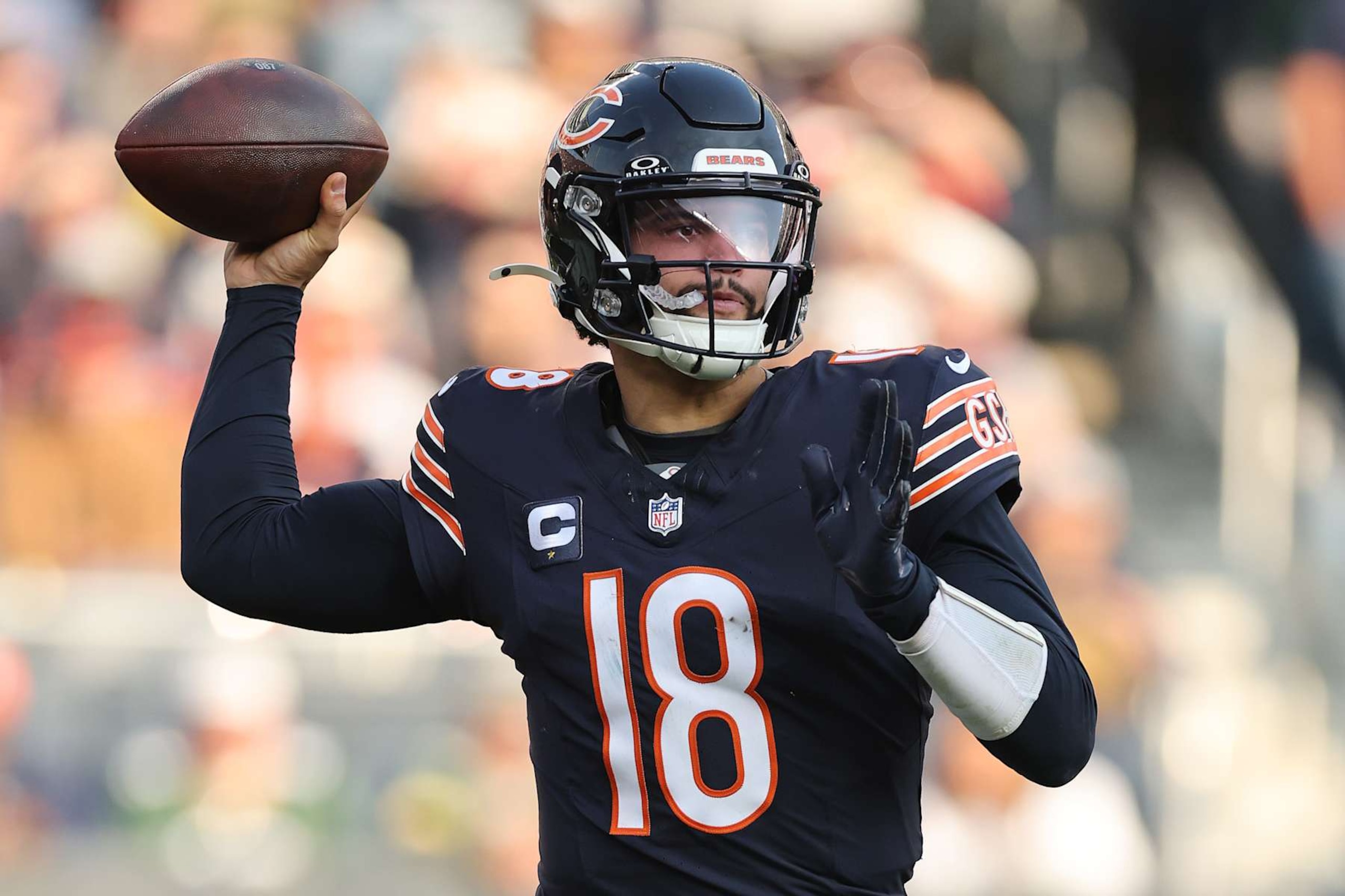 CHICAGO, ILLINOIS - NOVEMBER 17: Caleb Williams #18 of the Chicago Bears throws a pass against the Green Bay Packers at Soldier Field on November 17, 2024 in Chicago, Illinois. (Photo by Michael Reaves/Getty Images) CHICAGO, ILLINOIS - NOVEMBER 17: Caleb Williams #18 of the Chicago Bears throws a pass against the Green Bay Packers at Soldier Field on November 17, 2024 in Chicago, Illinois. (Photo by Michael Reaves/Getty Images)